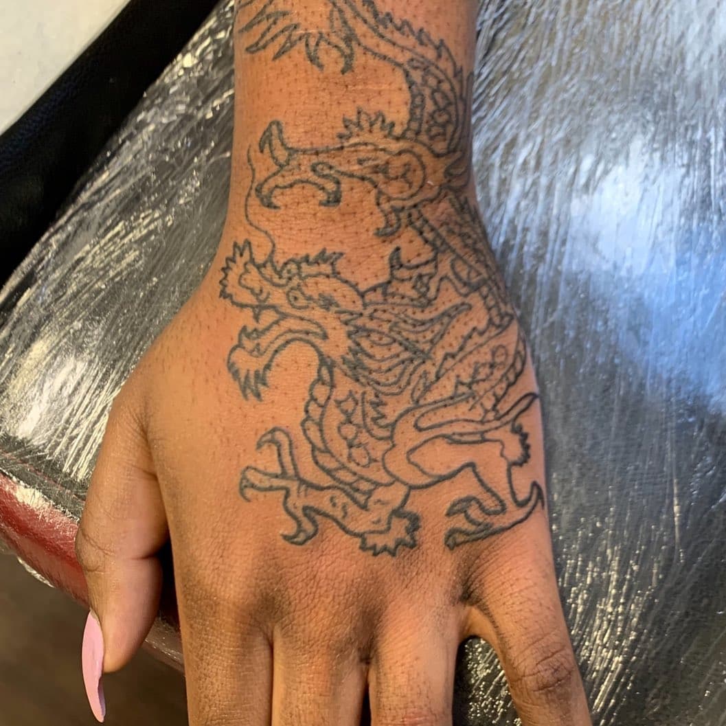 A Don Ed Hardy dragon done before this soul destroying lockdown. See you on the flip side people. Stay safe 🖤 #donedhardy #donedhardydesigns #edhardytattoo #notedhardy #tattoo #handtattoo