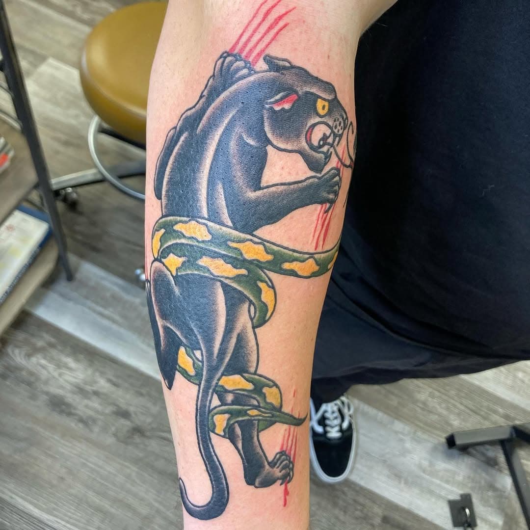 Panther vs snake on my buddy @neckbeardnick_ @angryelephanttattoos Brandon.