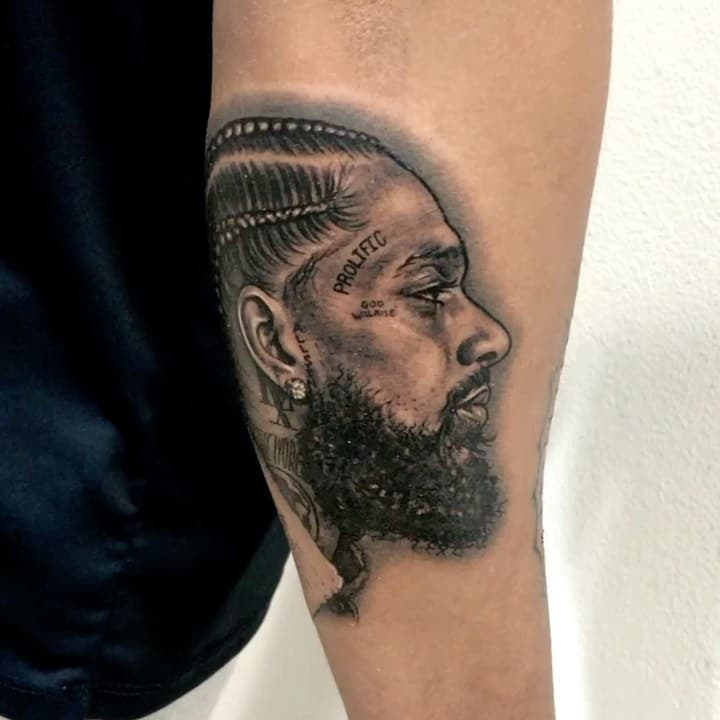 @nipseyhussle portrait before we started the rest of Marco’s sleeve. Tysm to our clients for the trust 🙏🏼swipe right to see it healed 
.
.
.
🎵 @nipseyhussle 
 @goodvibestattooshop 
#nipseyhussle #nipsey #themarathoncontinues goodvibes #goodvibestattoo #miniportrait #portrait #portraittattoos #blackandgrey #blackandgreytattoos #tattoo #bng #blackandgreytattoo #realism #realistictattoo #realistictattoos #ie #la #ietattooartist #latattooartist #portraitartist #losangeles #shagbuilt #inkeeze #stencilstuff