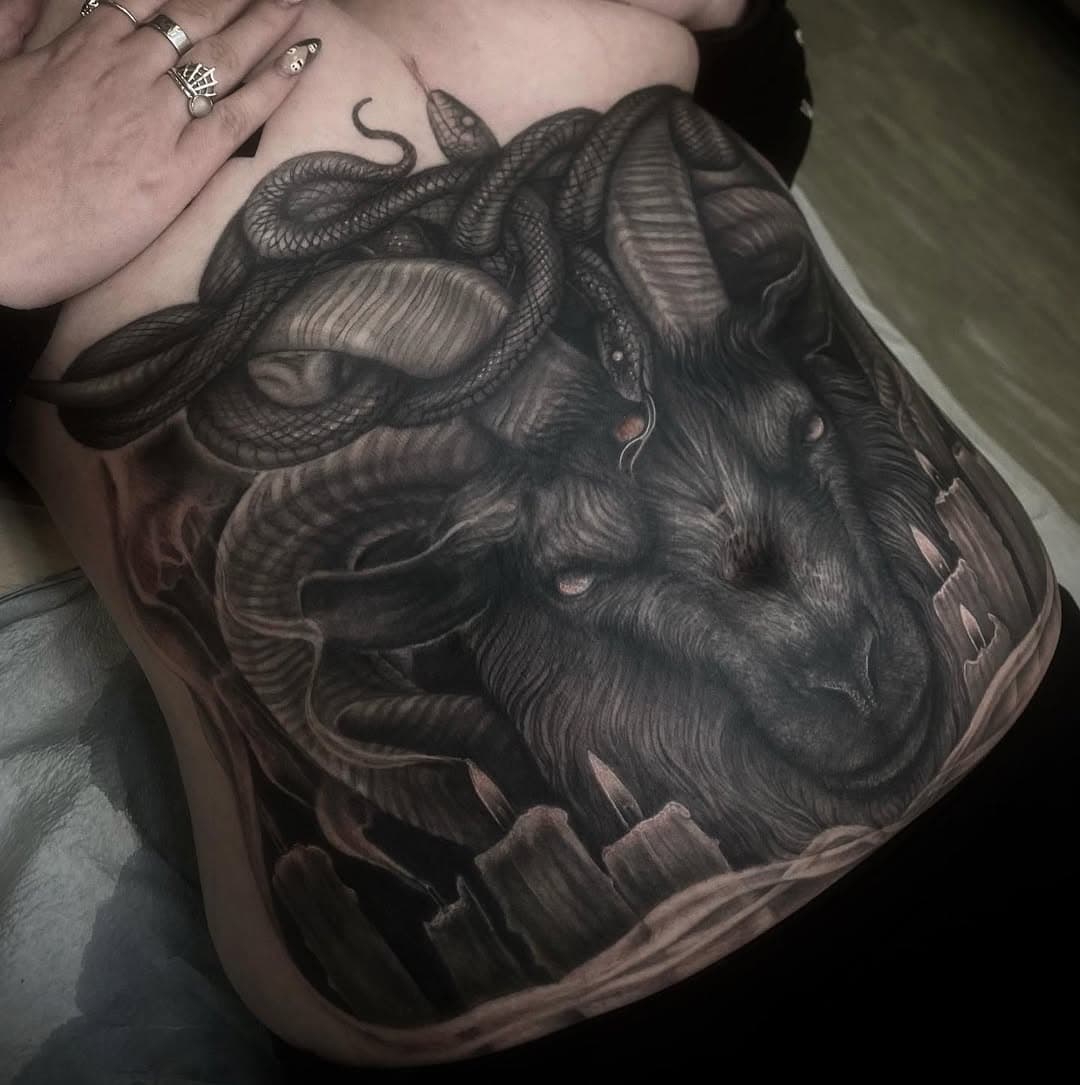 🐐 🕯 𝕭𝖆𝖕𝖍𝖔𝖒𝖊𝖙  𝕷𝖎𝖛𝖊𝖘 🐍 🔥 
Thanks so much dearest @coffinbait_ ❤️‍🔥 for choosing me to do this piece. I’m obsessed with it. 

Thanks so much to the lovely guys @technoirtattoo for having me there! 
❤️‍🔥🤌 ❤️‍🔥 

#cheyennetattooequipment #baphomet #baphomettattoo #occulttattoo #witchytattoo #evilink #thedarkestwork #stomachtattoo #inktober #goattattoo #satantattoo #satanictattoo