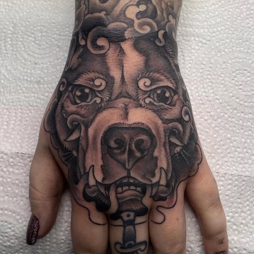 Cool dog tattoo made by @tototl.chris thank you @optimismandart for coming in an getting some cool tattoos!