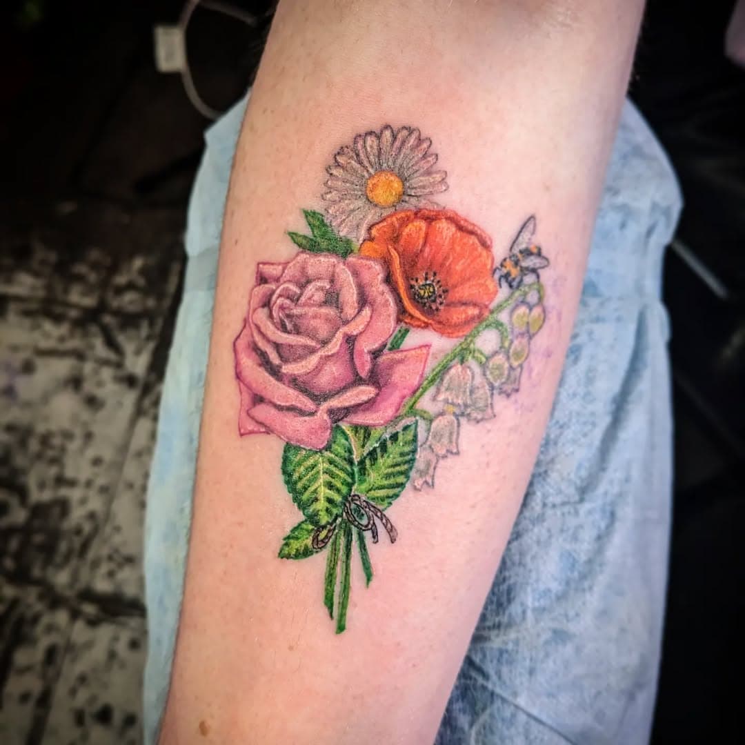 #tattoo #colortattoo #realismtattoo #flowers #flowertattoo #rosetattoo #poppytattoo #realistictattoo #realism #coloradospringstattooshop #coloradotattooartist #coloradospringstattooartist #tattooartist #tattooart