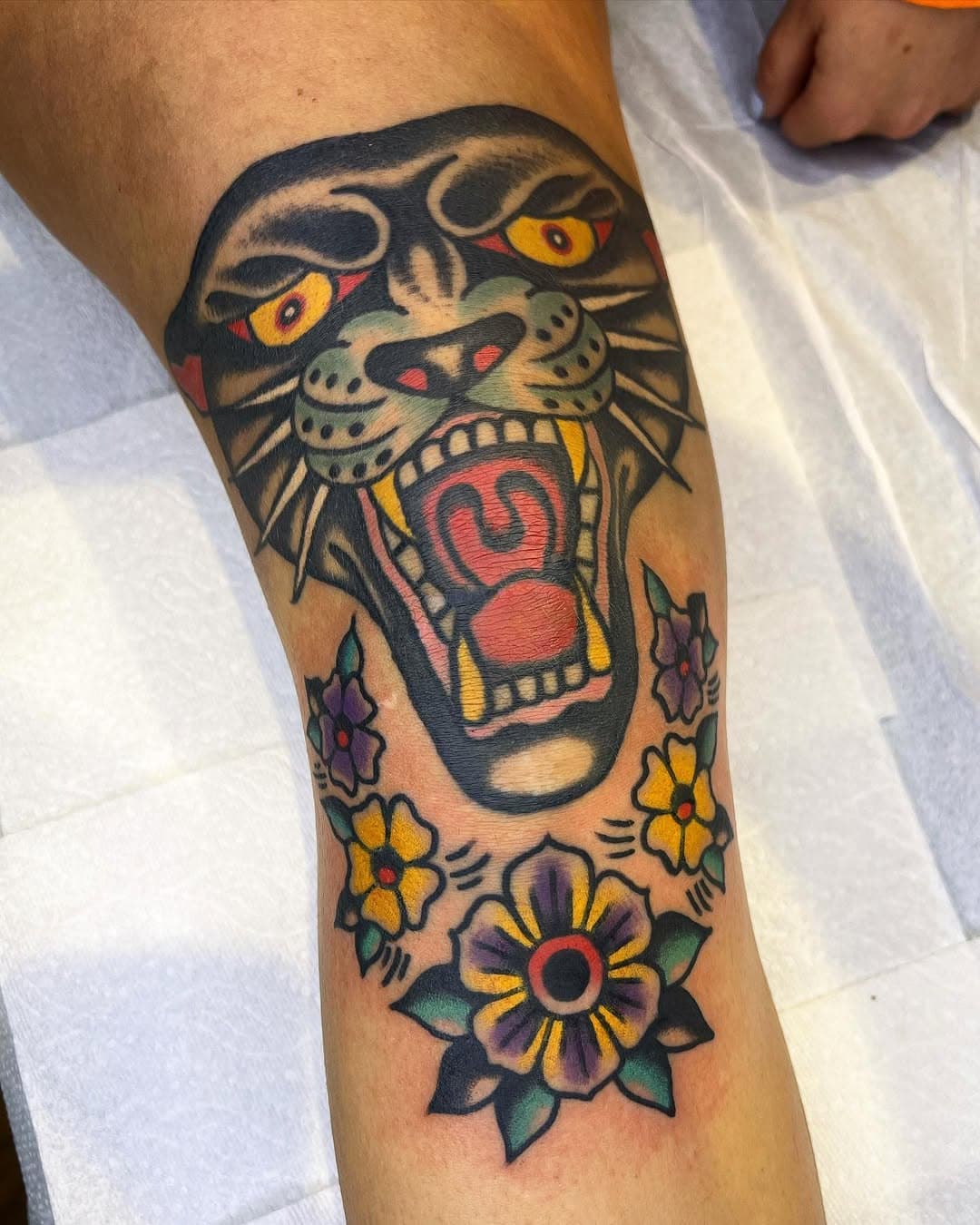 Healed panther, fresh flowers 
Done @cornerpockettattoo