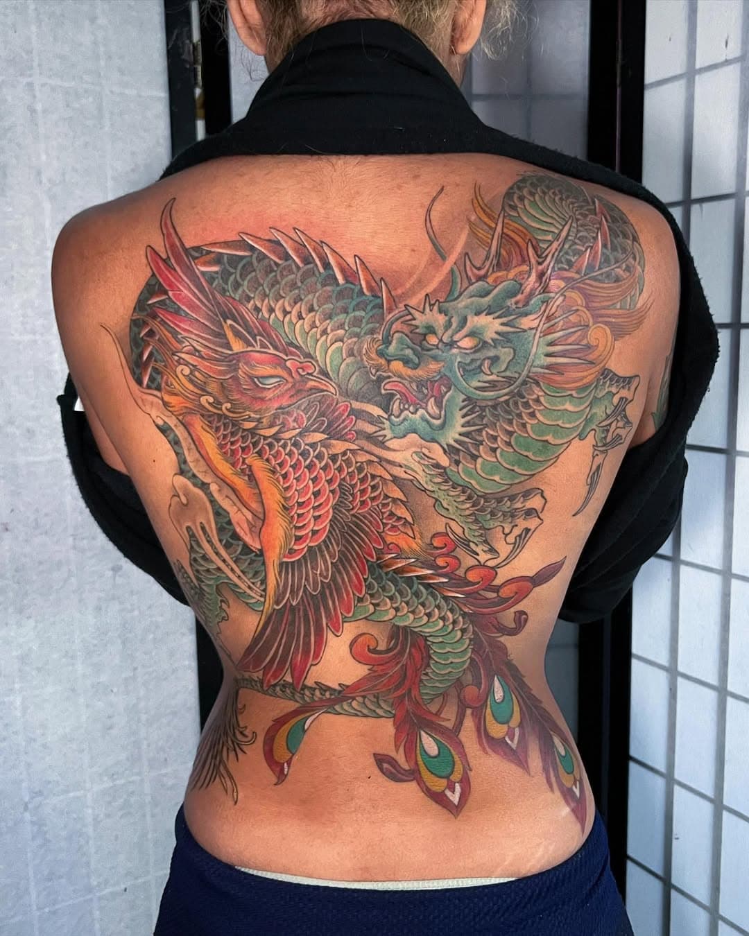 Finally finished this back up that we started late last year! Mahalo to my client for her dedication and consistency. First back of the year with a few more in progress. 
#dragontattoo #phoenixtattoo #needleninja #hawaiitattoo #japanesetattoo @blackmooncollectivehi