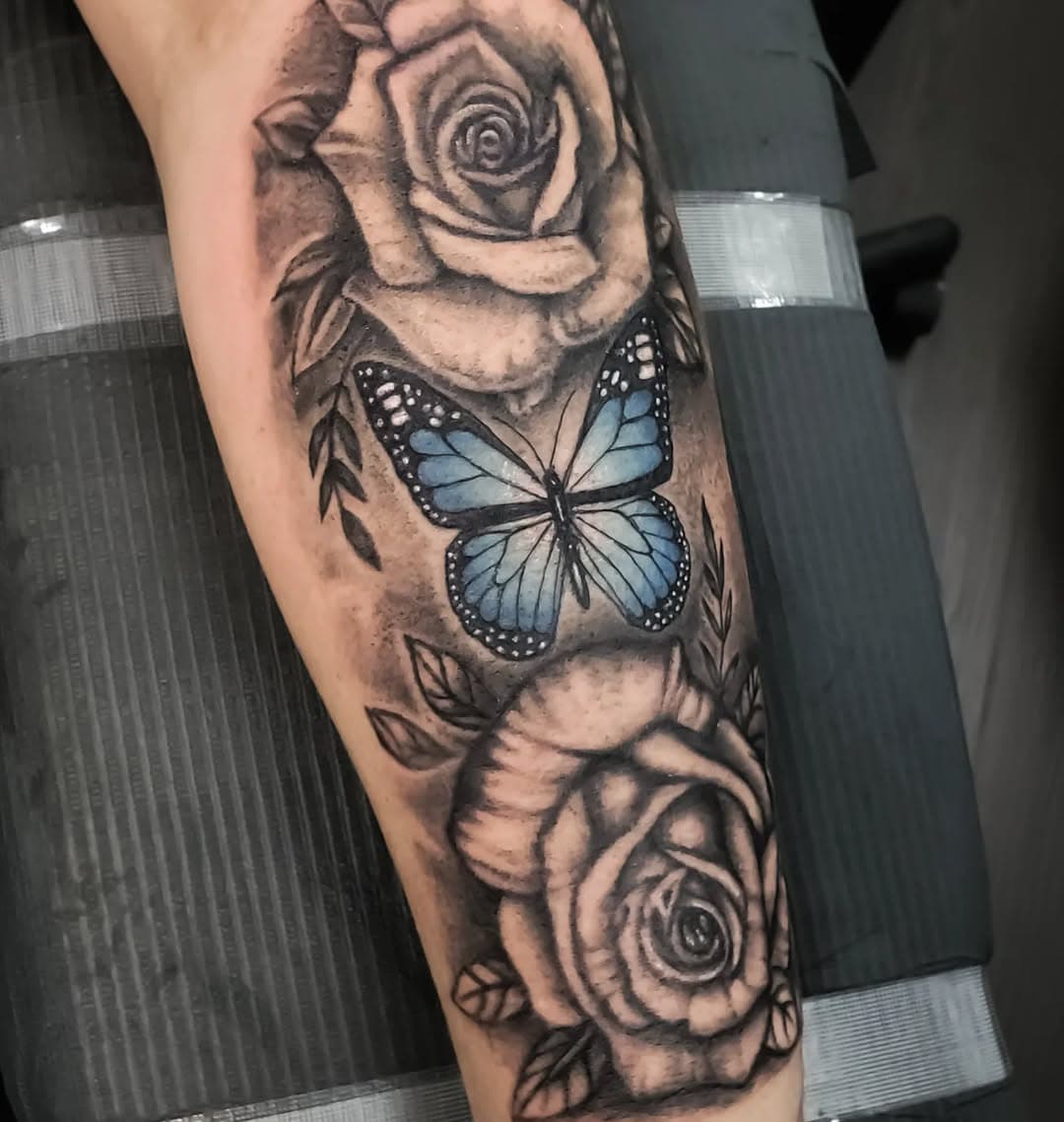 Roses and a butterfly 
Thanks Momo