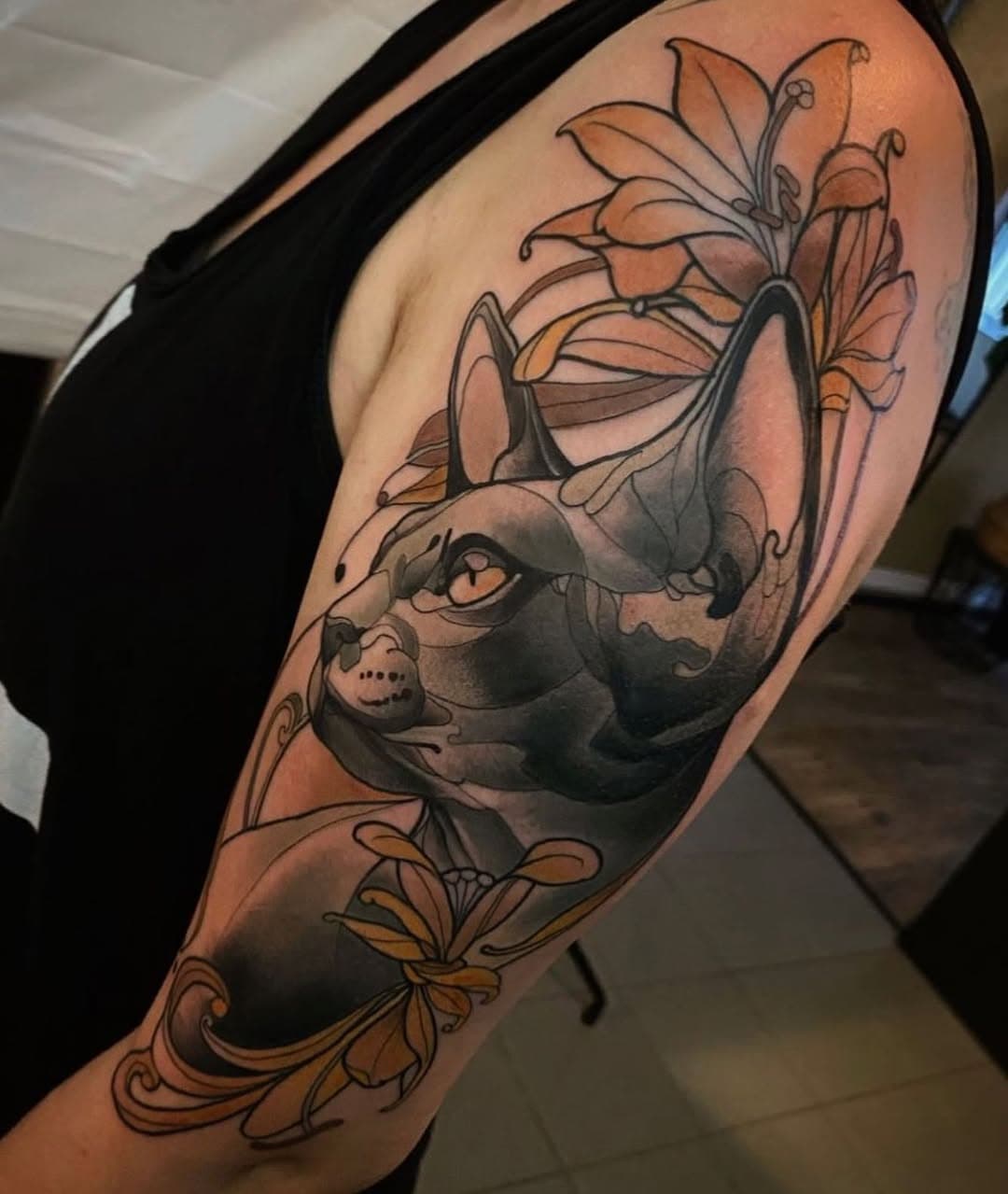 SPHYNX ❖ done a while ago. Thank you Anna! 🐈‍⬛ Done @hideoutatelier Leipzig. #sphynx #sphynxcat #cat #katze #pet #nacktkatze #lillies #lilien #florals #naturelovers #tattoonouveau #neotraditional #neotraditionaltattoo #ntgallery #neotradsub #neotradeu #neotradstyle #neotradworldwide #neotradsp #thebesttattooartists #tattoosnob #tttism #hideoutatelier #leipzigtattoo #leipzig done with @coalblack.supply @fivemoths @kurosumitattooink @worldfamousink @pepax.official