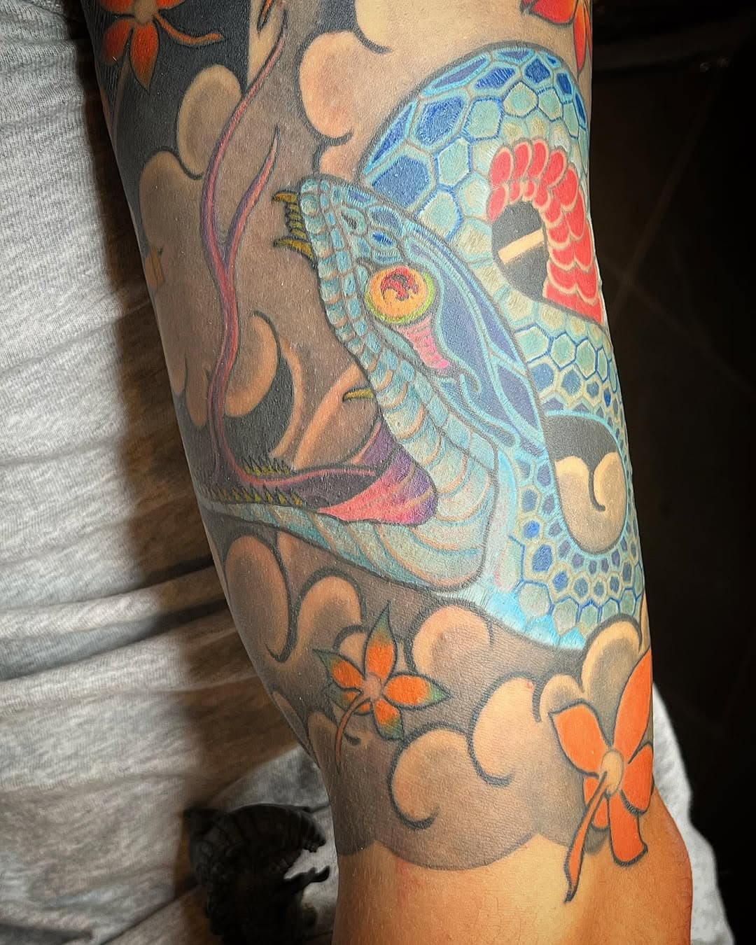 Snake in clouds with maple leaves. Done by @alex_paiva_tattoo #snaketattoo #snake #irezumi #irezumitattoo #irezumicollective #colortattoo #venicebeach #royalheritagetattoo