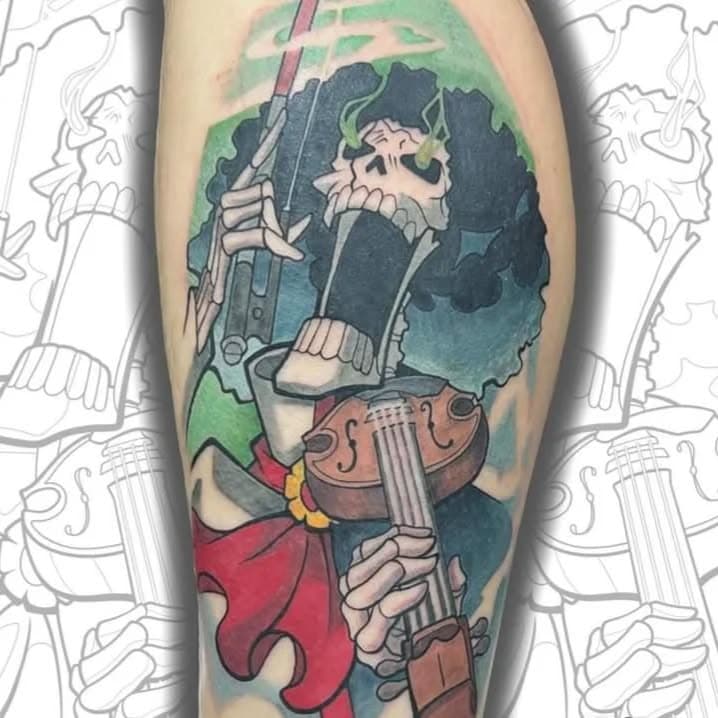 Soul king 💀 One piece Brook done by @nhtattooz at heavenly inkz orlando!

#brook #onepiece #onepiecetattoo #brooktattoo #soulking #violin #colortattoo #tattoo #tattooideas #tattooshop #blackandgreytattoo #animetattoo #anime