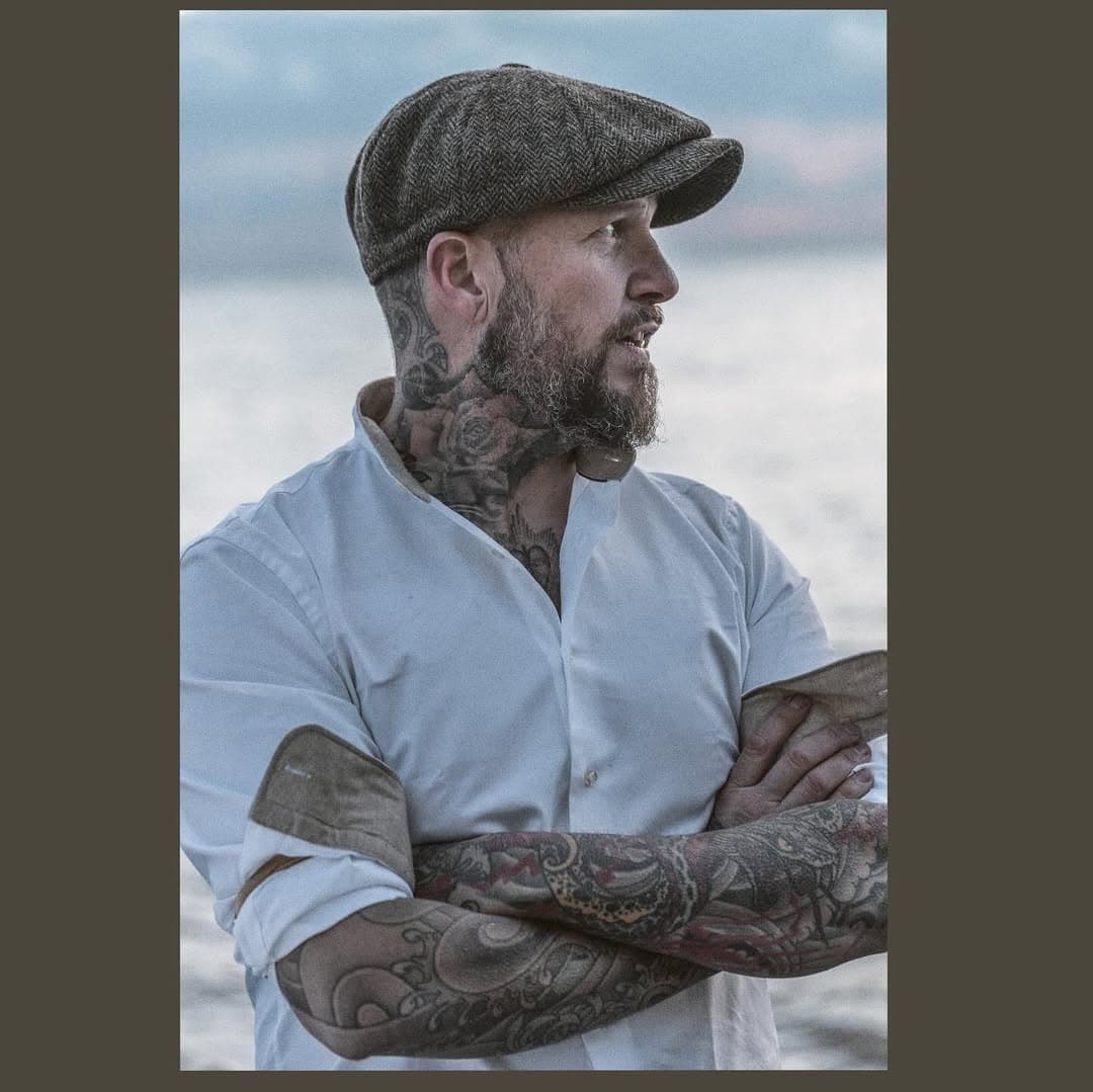 Tattooing.. man and boy from 1988, when I first got inked in 1990 and to now 2024. Tattooing with pens and felt tips in the back of class, to creating the @tattooworkshopbrighton 
13 years ago. 
I loved this craft 🖤 the smell, the sound, the edginess, the characters (customers and artists) from when I first walked into Bobby Bomwicks studio. Although it is changing rapidly, and has been, since I started 23 years ago.  I still tattoo every day as a full time job.  I still will be for as long as tattooing will have me. 🖤 it has been said I am partial to an oyster or 6, but ultimately this is what I love, and this is what I do. 
I am currently taking bookings for this year. 
The pictures are literally snippets of what I’ve pretty much specialised in over the years💥 I look forward to hearing from new and old customers. After all i do take DMs and my books are never closed … ✌🏼 peace 
Thank you for the support over the years. Thank you to @agnieszkatrzoch for the great shots of me 🖤 #brighton #brightonbeach #brightontattooartists #localartists #localartistsupport #tattooartist #tattooworkshopbrighton #brightonbornandbred #tattooed #tattooedmen #tattooedpeople #tattooart #tattooist #tattoostyle
