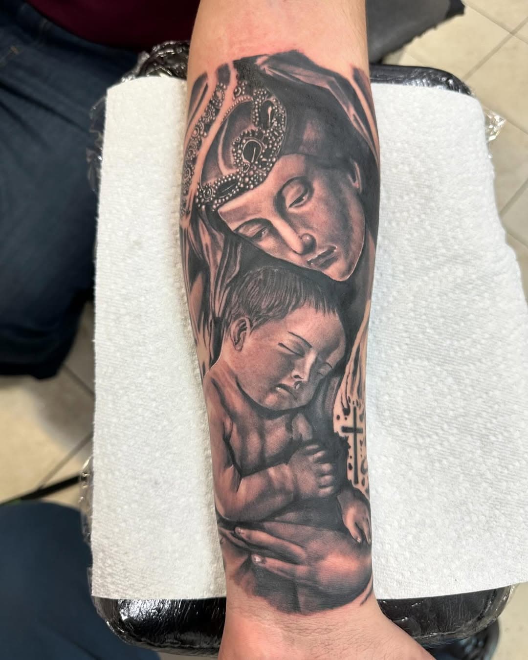 A Virgin Mary holding baby Jesus, this was a fun one to do.
If you guys need any black and grey I’m your guy. If interested in getting tattooed send a message or text, my books are open for this month and next. Thank you all for all the love and supporting appreciate you all.
#blackandgreytattoo #blackandgreytattoos 
#portraittattoo #portraittattoos 
#blackandgreyink #thanksforviewing
#sticktoyourguns #stayfocused
#nevergiveup #lovelife
#mividaartistica #workhard
#catholicphotography 
#savemefromthishellletmerestinpeaceb
#sendit #creature #virginmary 
#virginmarytattoo #localtattooartist 
#localartist #artistoninstagram
#religoustattoo 
#gothboy #gothboiclique #sadboy #tattoos #tattooartist #follow #fyp #foryoupage