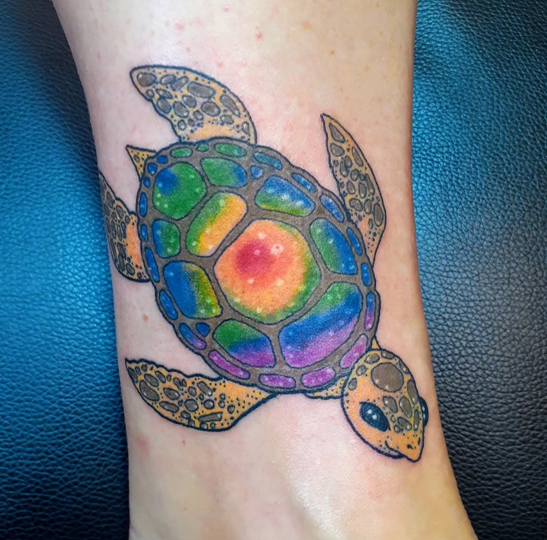 Super fun celestial sea turtle piece! #turtletattoo #seaturtle #seaturtletattoo #colortattoo #tattoo #nashuatattoo #lowelltattoo