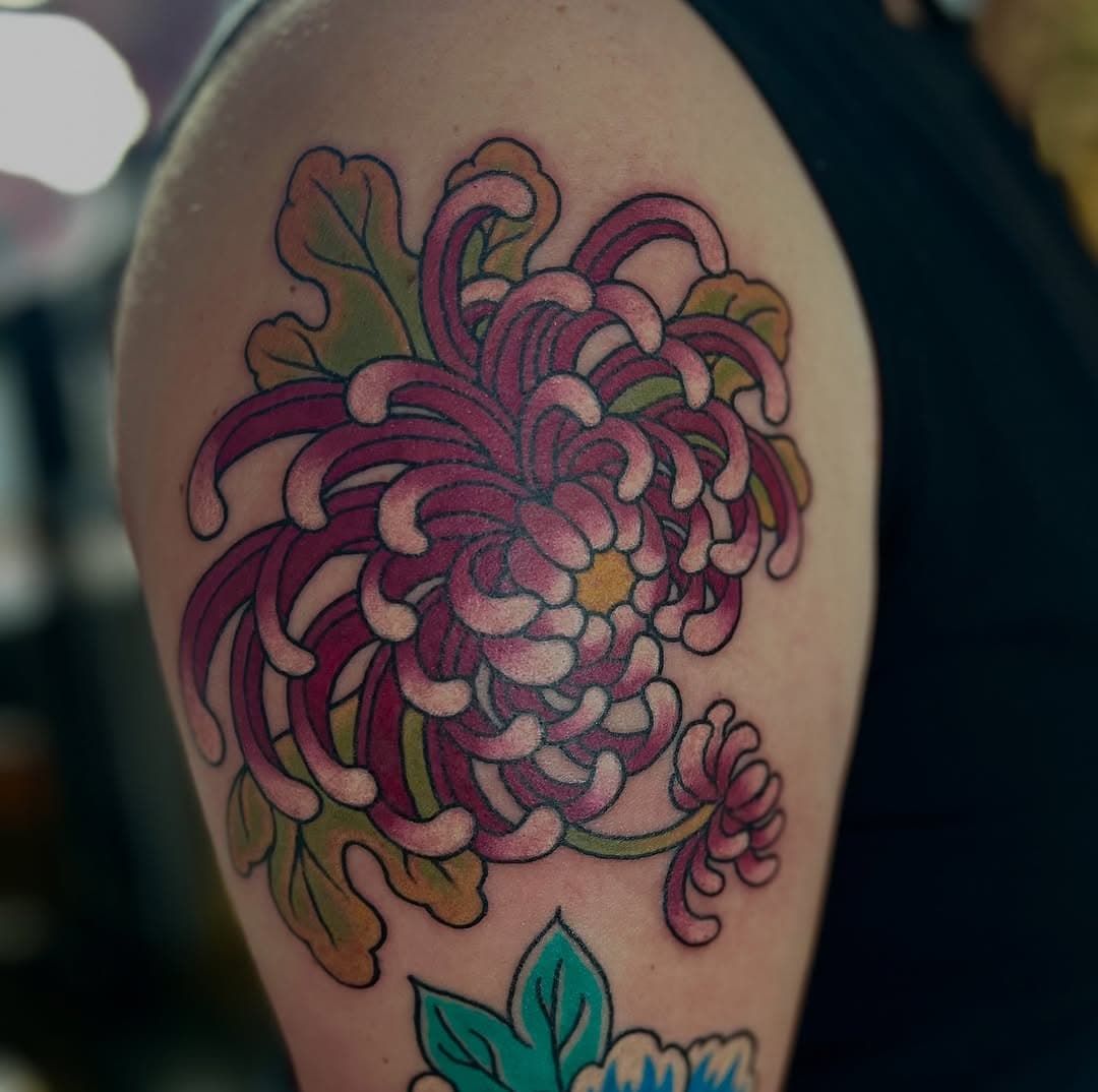 Chrysanthemum by @irezumistan 

Contact Jaime directly for appointments, he also takes walk-ins depending on availability Tuesdays, Fridays and Saturdays.