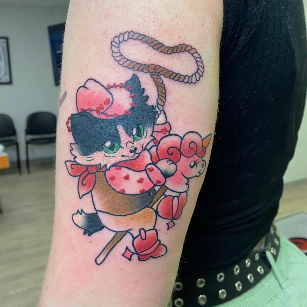 Not my design* I had a lot of fun tattooing this piece that @samyellsaboutducks brought me! 🤠😸🦄 #colortattoo #kittytattoo #heehaw #gittyup