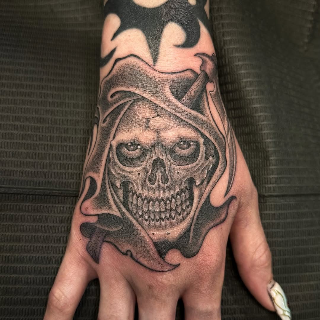 Super fun reaper hand tattoo for @maplestattoo made back in April. Thank you for coming to get this tattoo🫡 🙏 I’m now booking for the New Mexico Tattoo Fiesta and Immaculate Tattoo in Arizona this July. DM me to make an appointment 💌 @sombragrays @portcitytattooca .

🌟 #tattoos #blackandgreytattoo  #fineline #finelinetattoo #blackandgrey #dotwork #linework #singleneedletattoo #singleneedle  #blackandgreytattoo #tattoodoo #tttism #blackworkers #blxckink #tattoosnob #tattoolifemagazine #arizona 
#california #longbeach #blackwork #sombragrays #magicalwhite #ramtrx #sombras#portcitytattoo #reapertattoo #handtattoo #newmexicotattoofiesta #immaculatetattoo