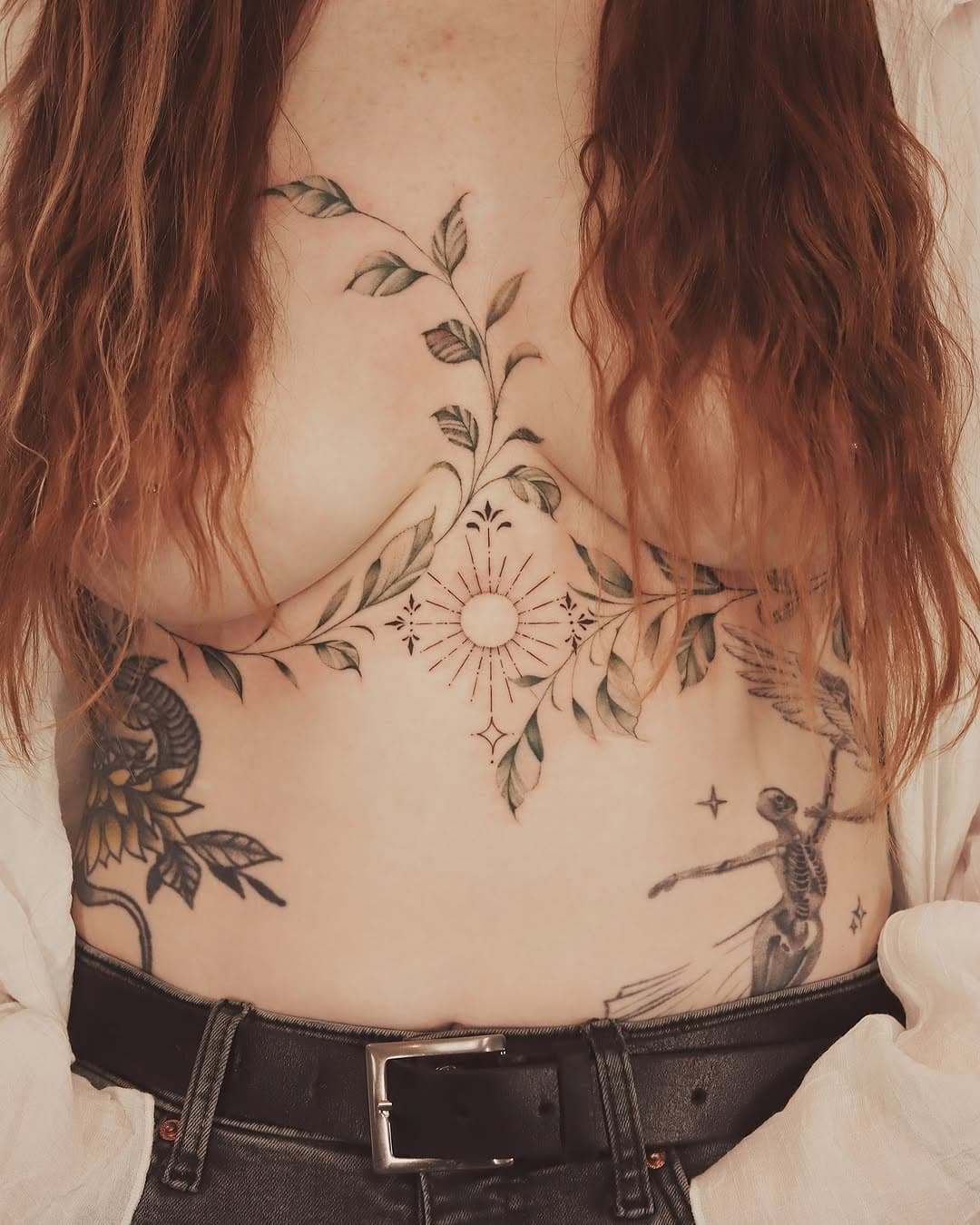 Joanna’s sternum is graced with a breathtaking tattoo, where a radiant sun merges with nature. 🌞🌿 Delicate green leaves sprout around the piece, symbolizing growth and renewal. This stunning design not only represents light and vitality but also her deep connection with the natural world. 

📩 for bookings check the links below 
www.brunotats.com 
https://bit.ly/Brunotats

 #tatuagem #flores #brazil #love #art #instagood #tattoo #flowers #photooftheday #cute #follow #instagram  #uk 
#pepax #pepaxofficial