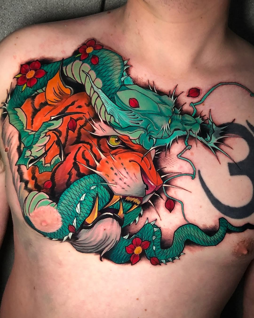 One of my favourites from an awhile ago on my friend Andreas, super fun piece we got to do in London ! 
For bookings DM or email me, Links on my profile. 
Made with @killerinktattoo @stencil.jam 
@shinraelectrictattoo 
#melbourne #melbournetattoo #tigertattoo #dragontattoo #irezumicollective #japaneseink