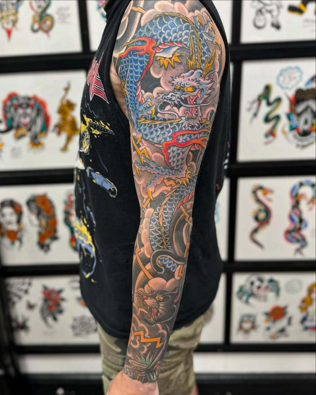 Dragons, panthers, skulls and lightning! What more could you need in a sleeve? Small cover up and working around the existing piece. Thanks for the trust and dedication, Jan.