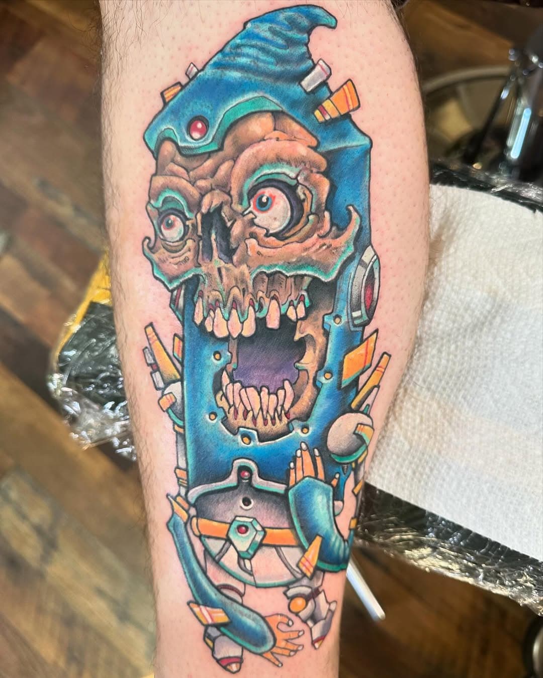 Oh, hey there.
Bill came in today and got this guy on his leg. 
It’s based on a painting I did some kind of forever ago; he saw it last time, liked it, remembered it, and made an appointment to get it. Very cool moves by Bill, I’ll tell you what… and I think it came out pretty cool, too.
You guys aren’t going to believe me when I tell you this, but, you too can totally get unique and interesting tattoos. It’s allowed. It’s encouraged, even. 
Or you can get what you want-that sweet sweet whatever that you’ve seen reproduced so many times that it MUST be good. I’m down for whatever. Every day is tattoo day, even when it isn’t cool color space dead guy day. 
As always, I’ll find time for you somewhere, but not if you call. Please, for both our sakes, email:
ampersandtattoo@gmail.com
and we’ll make some kind of magic happen.
Thanks ever so much.