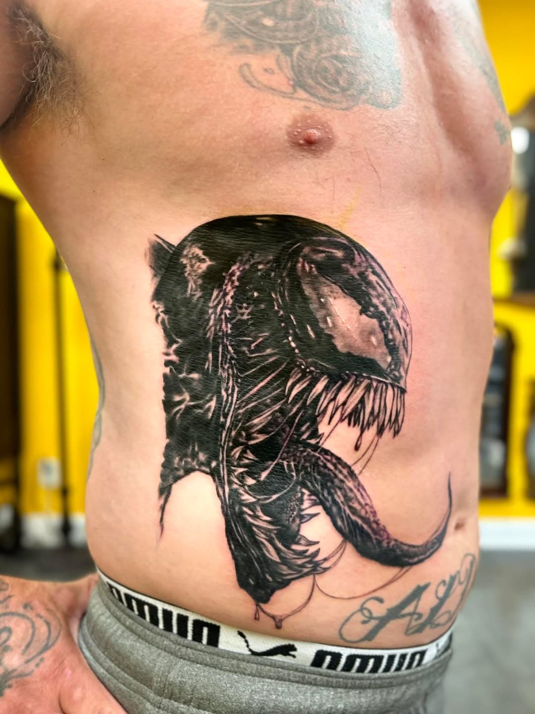 Venom done on Chris King here at Conquest Tattoo today. Next session we do, Carnage followed by more characters and background to eventually finish off the whole front of his torso. #VenomTattoo #Venom #Marvel #MarvelStudios #BlackAndGray #Portrait #Realism #RealisticTattoo #BestTattoos #AwesomeTattoos #BestTattooArtists #Chesco ￼￼