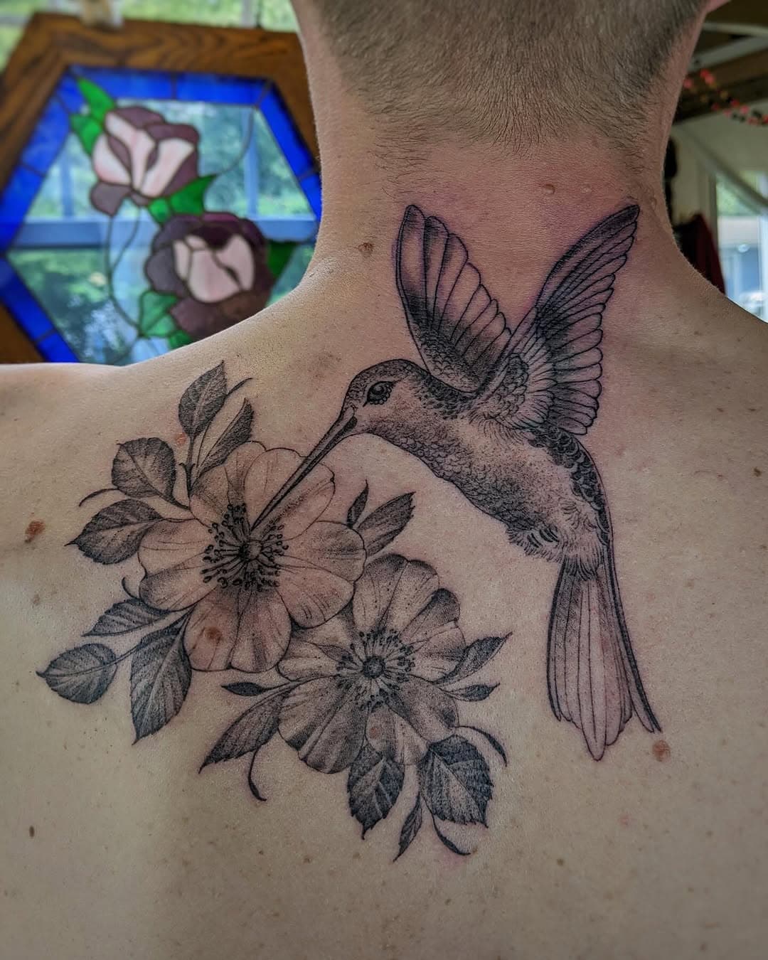 Hummingbird and florals for a rad guy and his guides, their first! thank you for this day and keeping me in mind all these years. Tattooing old homies is so chill. Healed photo taken a few months after. Finished that day with a paddle, onto the next one bud!