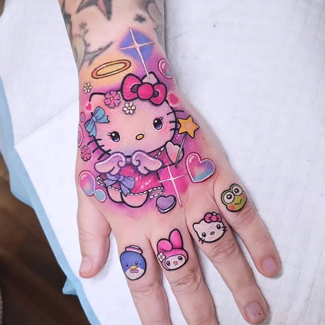 🩷🩷Hello Kitty angel🩷🩷🌙 

Recent hand and knucks set for lovely Zoe. naughty Kitty set to match coming soon 💜

Sponsor 
@starbritecolors 
@justatsupplies 
@roseneedlesbyjustat (cartridges) 
@drpickles_ (aftercare) 

#tattoo #melbourne #tattoos #gamerink #geektattoos #cutetattoo #hellokittylover #sanriotattoo #cinnamoroll #sanriotattoo #初音ミク#japantattoo #nerdtattoo #sanrio #nerdtattoos #animetattoo #gamertattoo #gamerink #manga #kawaiitattoo #girlytattoos #cutetattoos #melbournetattoo #carlykawaii