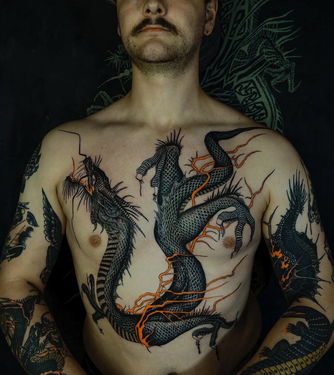 A large dragon torso tattoo for my brother @davies_seb over four sessions. Thankyou for getting such a cool design! In my opinion this is one of the best dragon tattoo designs out there. 

I referenced the design from the dragon tattoo on the chest of a Mr De Bathe. The tattoo was originally applied by Sutherland Macdonald; you can see the reference photo (c1905) I used for my version on the third slide. 

For any further reading on Sutherland and early 20th century British tattooing,  I highly reccomend the book ‘Pioneers of British Tattooing’ published recently by @scottishtattoohistory