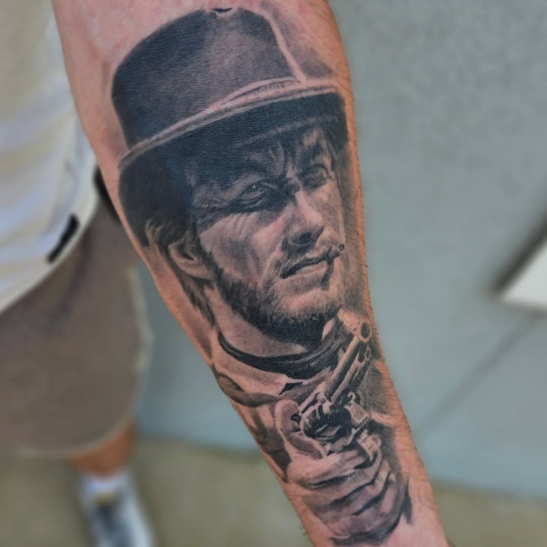 Healed photo of some cowboy 

#Clinteastwood #western #cowboy #tattoo #tattoos  #tattooed #tattooer #tattooartist #tattooart #tattooedmen #ink #inked #inkart #inkedup #inkaddict  #blackandgray #blackandgraytattoo #blackandgrey #blackandgreytattoo #realism #realismtattoo #realistic #portrait #portraittattoo #realistictattoo #biloxi #gulfport #gulfcoast