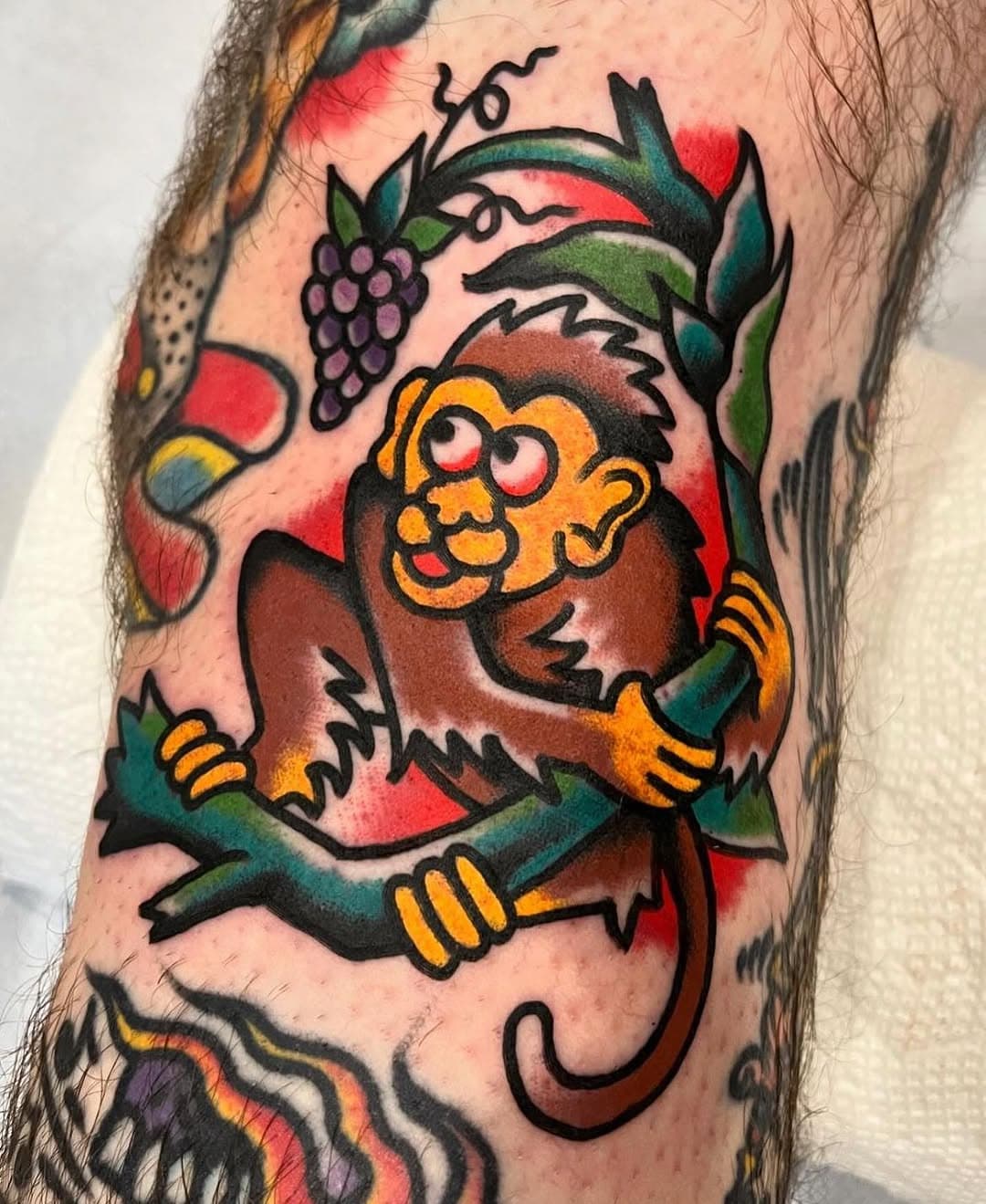 Grape Ape! @j.zanghi is Portland’s own Jane Goodall of tattooing. Book with him for the fall. Go bananas.  Be Tarzan. #goldstartattoo #portlandoldport #portlandmaine #traditionaltattoo #tigerking #alleytats