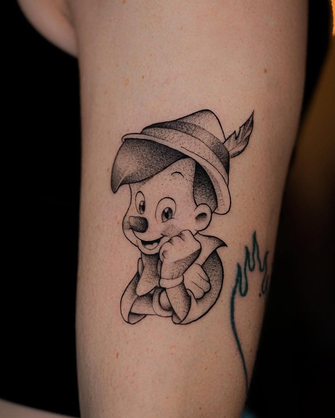 Pinocchio 🪵✨
Done at @ave_lights (Roma)

Info & Booking by dm or whatsapp (link in bio)

#tattoo #tattoos #tattooer #disney #disneytattoo #dotwork #dotworktattoo #blackink #newschooltattoo #romatattoo