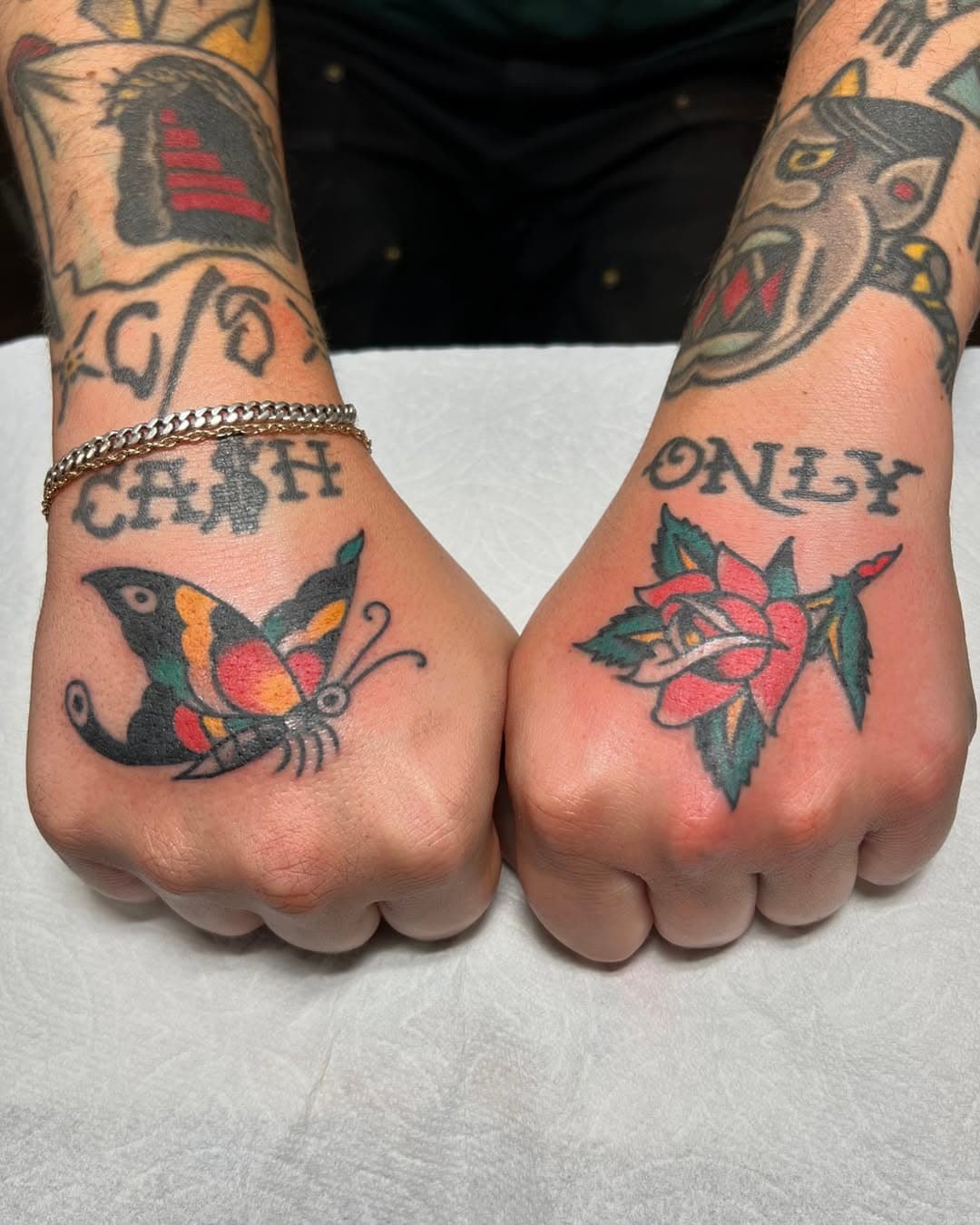 Hands for our road dawg, @josef.algarin. Butterfly by @rosscarlsontatz and rose by @tobiasmcmillin. 🌹🦋