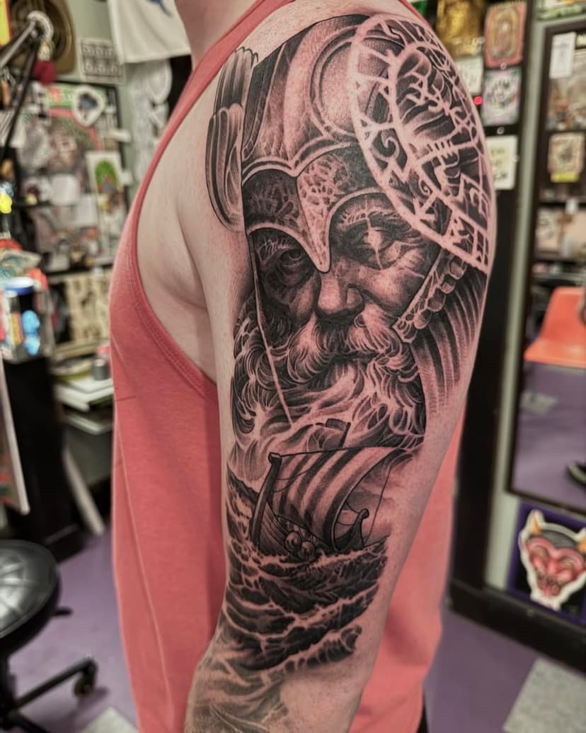 Just wrapped up an epic 7-hour tattoo session! 

 Today, I brought to life the mighty Odin, the Norse god of wisdom, war, and death, in the misty sky above a Viking longboat. 🛶💪 

This piece blends black and grey realism with my own stylized twist, capturing the  essence of Norse mythology. ⚔️🌌 

Each detail tells a story of strength and adventure, reflecting the spirit of the Vikings and their legendary tales. 

Thanks so much Dan, you rule! 

#TattooArt #NorseMythology #Odin #VikingTattoo #BlackAndGrey #TattooArtist #InkLife #BodyArt