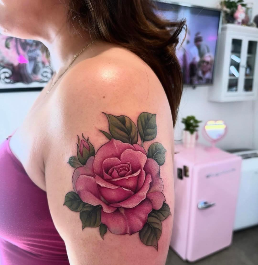 Love a simple classy rose 🌹 also can you tell what we had streaming on the TV?😂 #rosetattoo#tattoo#girltattoo