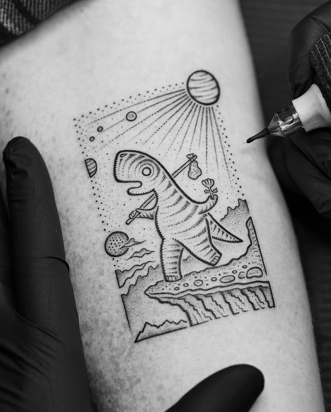 ● ‘The Dinosaur Fool’ ● 
°
My dinosaur interpretation of ‘The Fool’ tarot card. Would love to work on more of these tarot card variations. Big thanks to Joe for the trust with the project. Done at @studio__hatch 🐟
°
°
For booking enquiries please email:
●  bookings@mikestouttattoo.co.uk ●
°
°
Made using needles from @tatsoul @envyneedles @barber_dts 🪡 Process butter by @hustlebutterdeluxe 🍯
°
°
#thefool #tarotcardtattoo #tarot #tarotcards #hustlebutterpro #barberdts #tatsoul #envyneedles