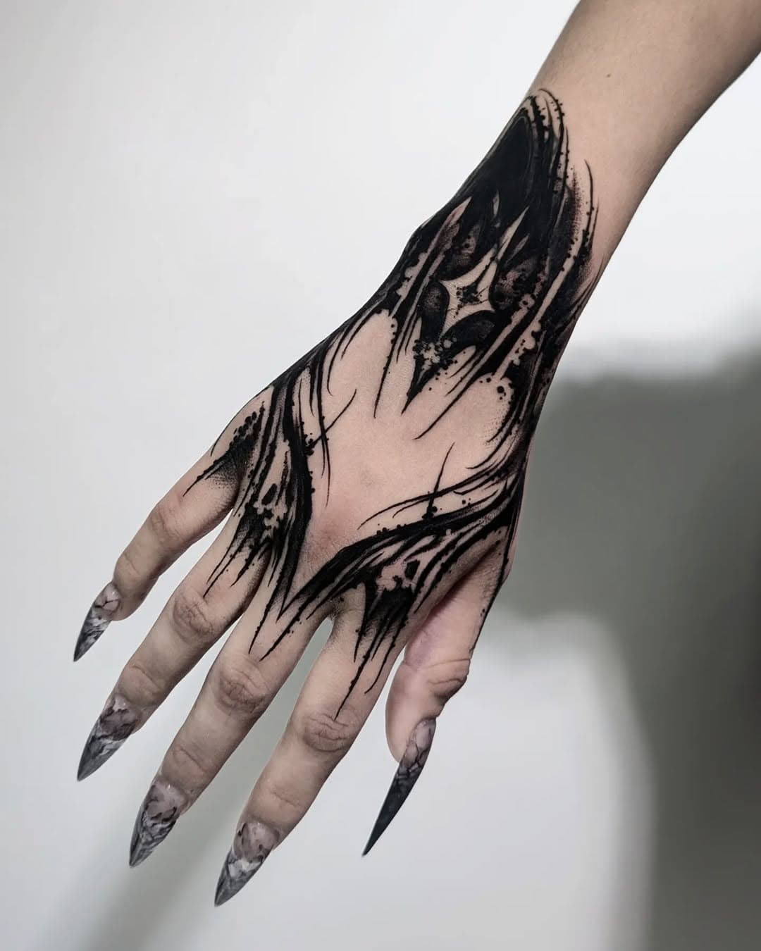 Hand tattoo that covers up a little wrist tattoo 🖤
.
Sponsored by @kwadron
.
#tattoo  #tattooist #artist
#blacktattoo #darkartandcraft #blackwork #blackink #onlythedarkest #onlyblackart #otd #btattooing #darkart #blacktattooart #instagramart #insta_blackwork #occultarcana #artesobscurae #uktta #blackworktattoo #uktattooartist #inkedmag  #bkktattoo #tttism #darklettering666 #kwadroninx #kwadron