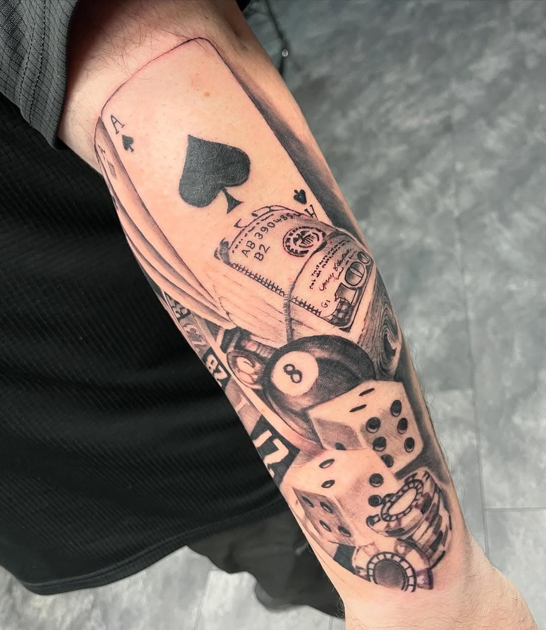 Gambling piece with clients’ sentimental numbers #gambling#poker#gamblingtattoo#tattoo#ink#tattooartist#blackandgrey#roulette#cards#chips#realism#realistictattoo#blackandgreytattoo#sleevetattoo#money#dollar