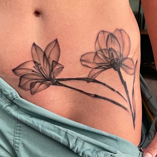 A beautiful addition, xray florals over a tummy tuck scar. Embrace yourself. 

#floral #floraltattoo #xray #fineline #finelinetatoo #inked #calgary #calgarytattoo #cochrane #cochranetattoo #yyc #flower #flowertattoo #xraytattoo #negative #photonegative #cochraneartist #calgaryartist #bowvalley #banff #canmore #alberta #bodyart