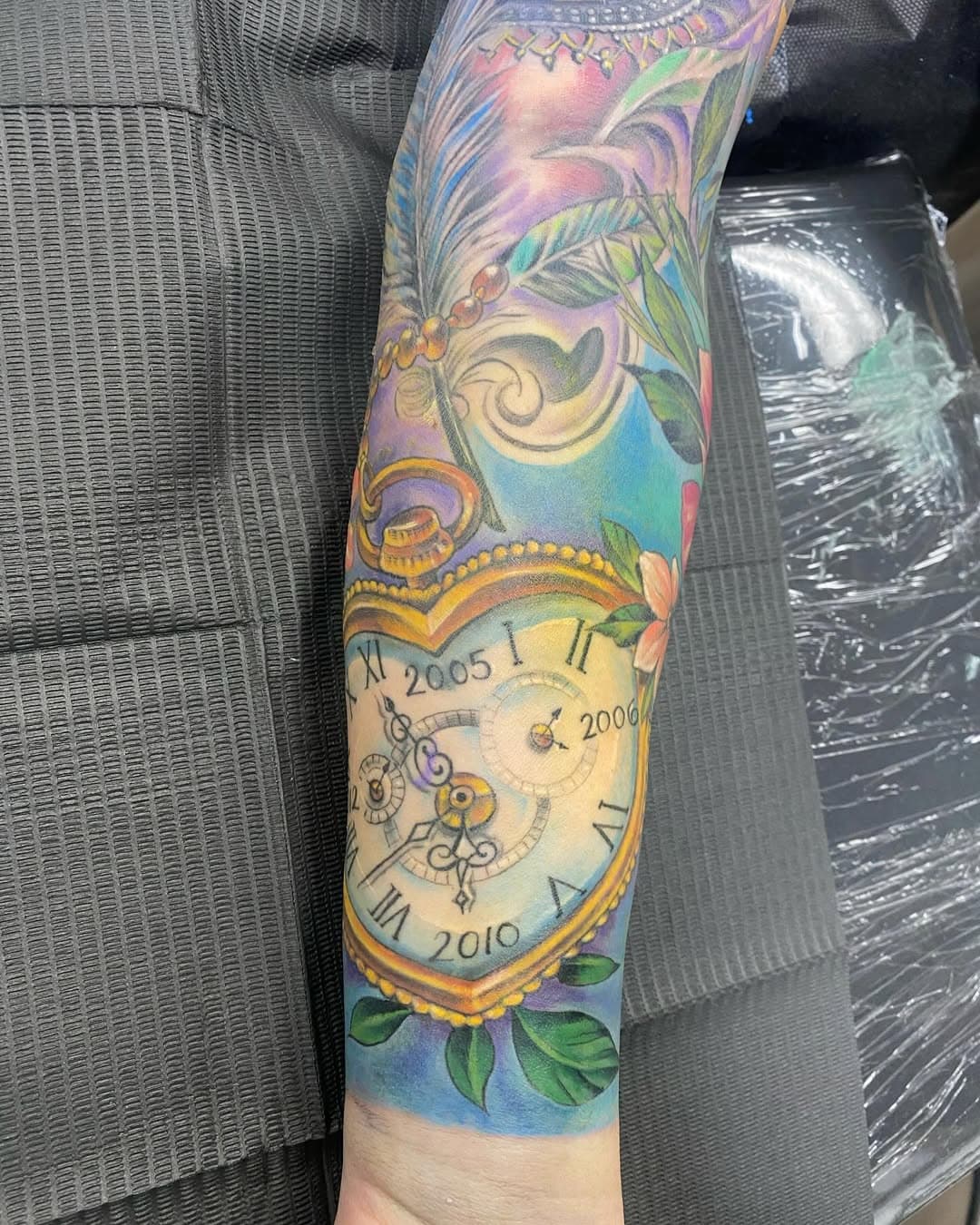 Mintcondition tattoo #colorsleeve #poketwatch #flowers #tattoo