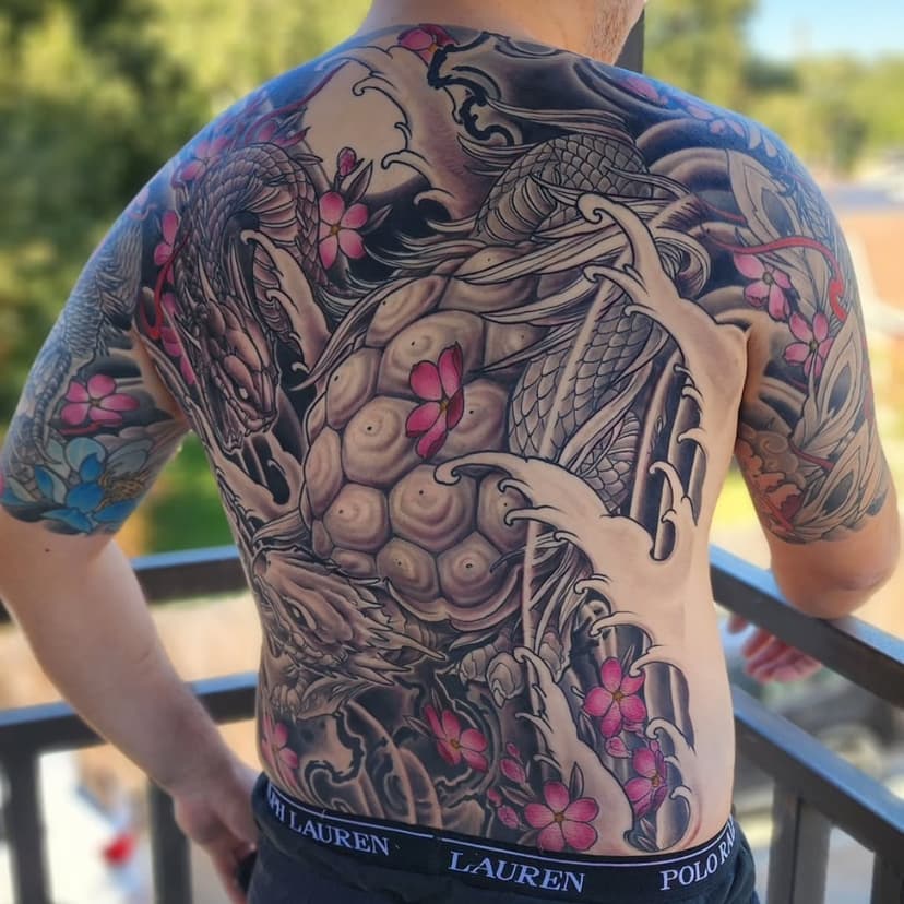 Finished up Genbu to complete the upper suit... thank you again David for coming down.  We'd finished the arms and chest a couple (few) years ago. Some long days and great conversations in there.  Cheers!
.
.
#genbu #backpiece #bodysuit #japanesetattoo #dragon #sakura #phenix #tattoo #irezumi #lakecharles #ironcypress #louisianatattoo #irezumicollective