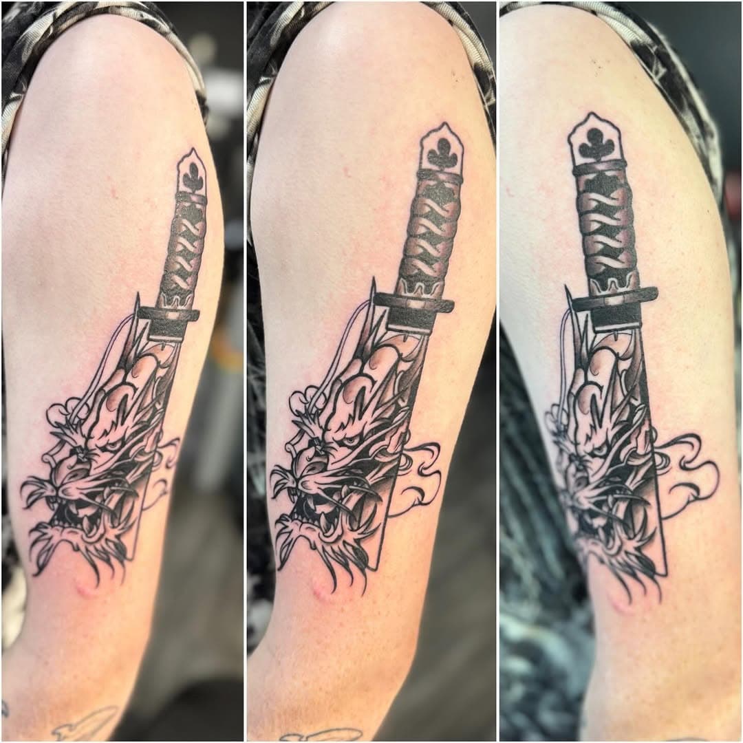 Happy lil dragon dagger
.
.
.
Sponsored artist by @terramedtattoobalm2023 
.
#tattoo #tattoos #ink #tattooartist #inked #art #tattooart #tattooed #tattooideas #tattoolife #artist #tattoodesign #blackandgreytattoo #blackwork #love #tattooing #tattooist #tatuagem #instagood #tattooink #tattoostyle #tatuajes #traditionaltattoo #tatuaje #tattooer #blackworktattoo #tattooflash #colortattoo #photography #finelinetattoo
.
@tattooeverythingsupplies 
@rawtattoosupplies 
@rawpigmentseu 
@rawpigments 
@thermatekk 
@ghosttattooco 
@ghostcartridges 
@peachtattoosupply 
@peachcartridge