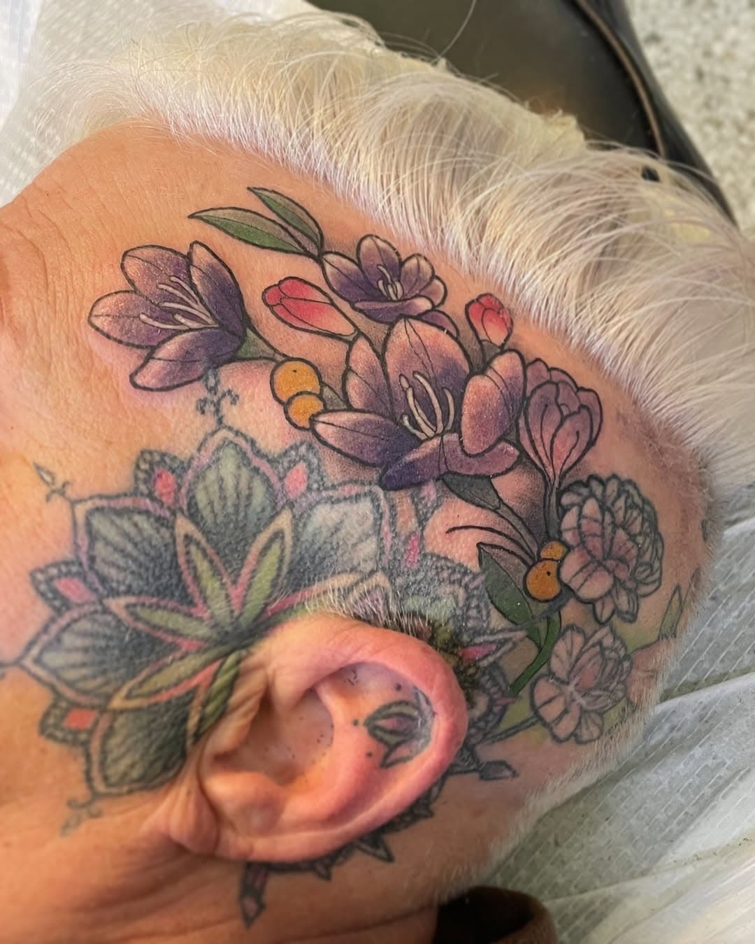 Finally getting a start on posting my 3 year backlog of tattoo photos 😅

I did these head flowers on Beth recently! Thanks for all of the years of trust & friendship, ily 🫶🏽

Currently booking end of January/February. I do have a waitlist in case of cancellations. DM to book 💐