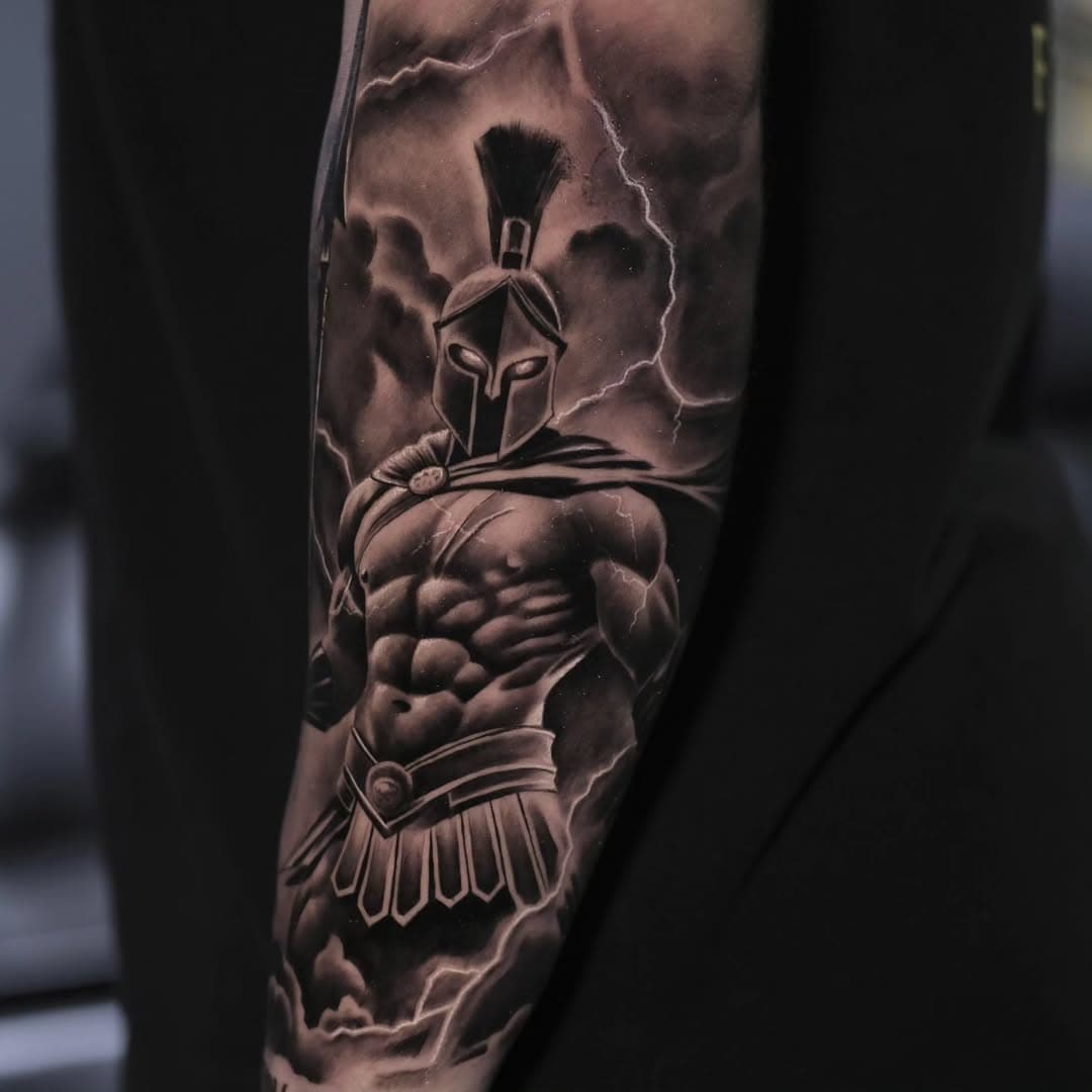 Forged in storms, built for battle ⚡️🛡️ This Spartan tattoo embodies strength, resilience, and the spirit of a true warrior.

For booking inquiries, please visit the link in my bio. 

Done @certifiedtattoostudios

 #SpartanInk #Warrior#TattooArt #denver
#denvertattooartist #houstontattooartist #houstonartist #blackandgreytattoo #tattooed #tattoostyle #tattoomodel #tattooshop #tattoowork #tattoosleeve #tattoocomunity