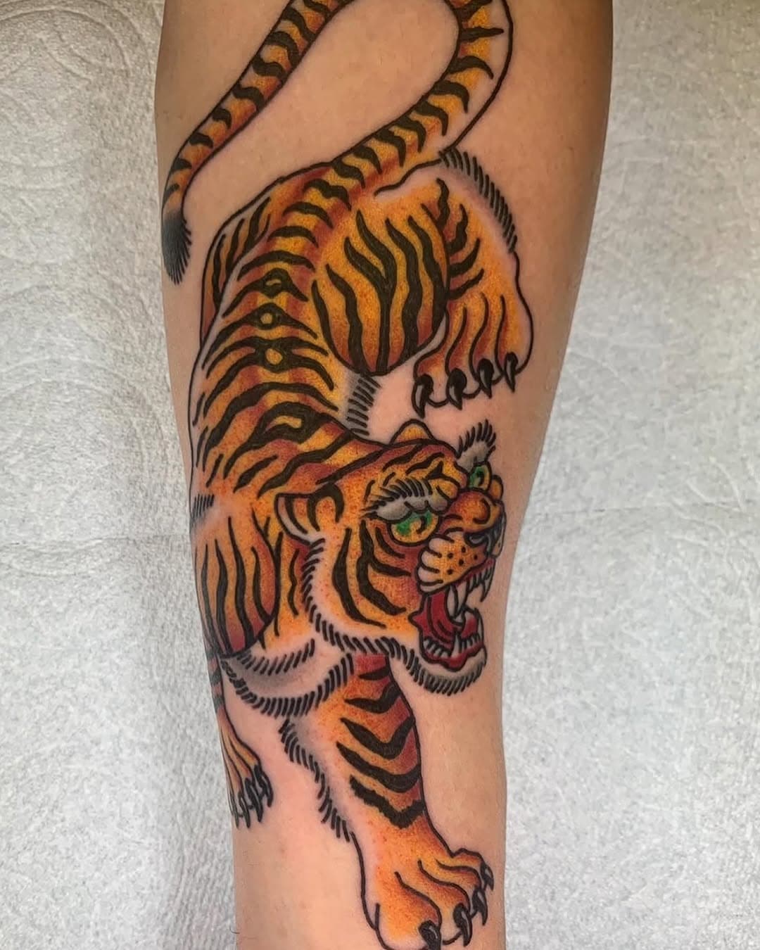 Rawwwr by @paulwebbtattoos Done at @fallencrowtattoo using @fusion_ink @tatsoul @criticaltattoosupply @jetblacksupply @electrumsupply @secondskintac @holderink

#inkedmag #skinartmag #tattoosnob #fusionink #tatsoul #criticalpowersupply #jetblacksupply #electrumsupply #secondskintac #traditionaltattoo #trad #tigertattoo