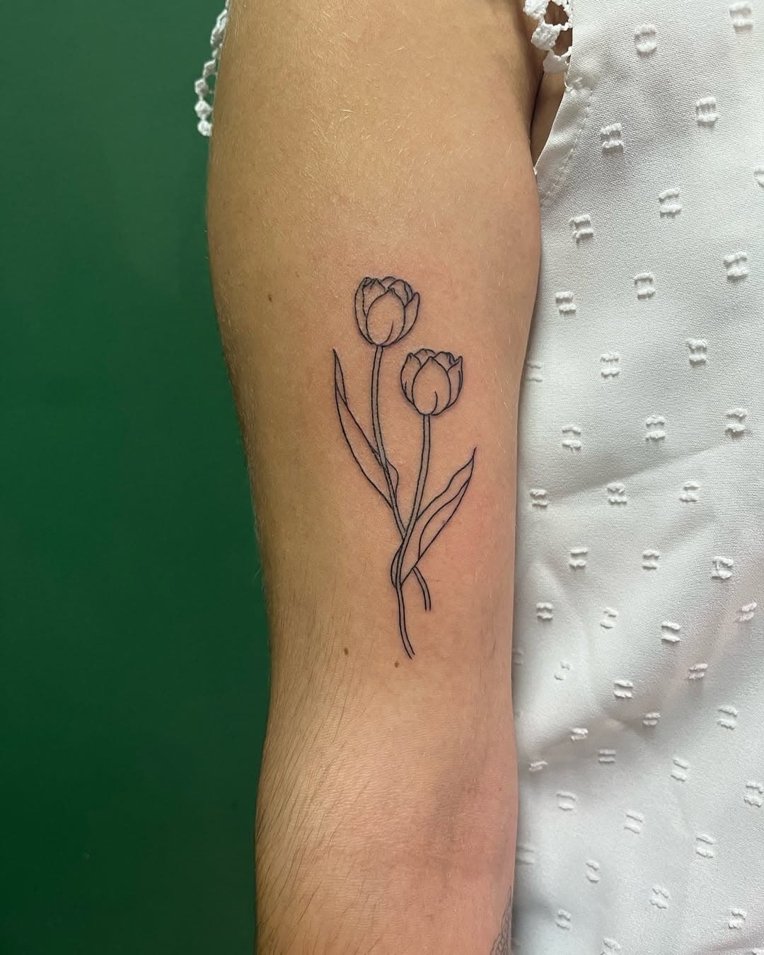 tulip done at @inkorporated.amsterdam 
DM for bookings 
#tuliptattoo 
#tattooamsterdam
#tatouage
#tatuaggi
#amsterdamtattoo
#finelinetattoo 
#tattooideas 
#floraltattoo
#flowertattoo