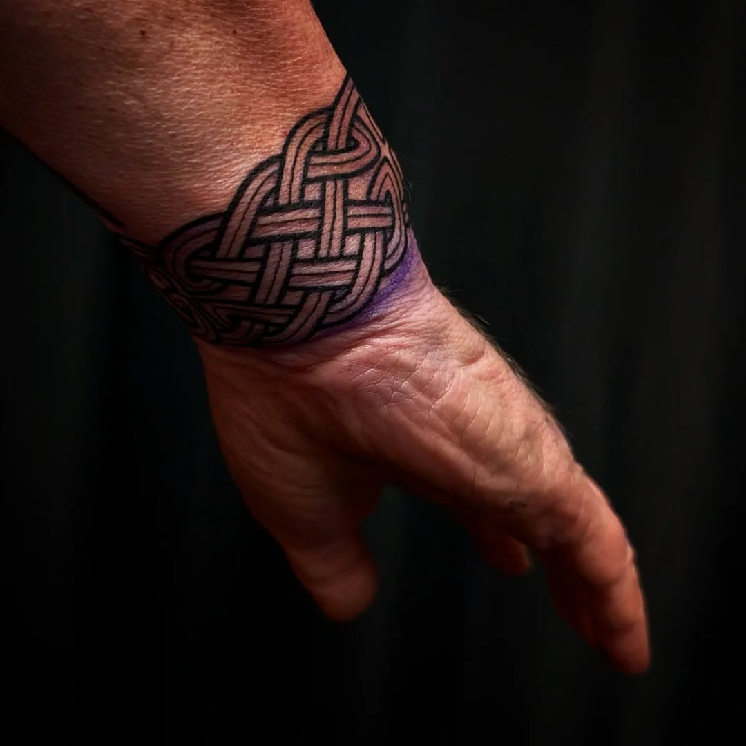 I am absolutely loving all the requests for Knotwork bands that I've been getting recently. This one was a linework only band, with no black background, just pure linework. 

I was gonna make an announcement about my 2025 availability but I couldn't work out how to do a reminder on Instagram so I guess I'll just say that my books are open now, and I will be processing the requests next FRIDAY. 

On that note, I currently only have ONE space left in January and ONE space left in February, with March half booked too. So if you would like an appointment in those dates, get in touch asap. 

I would love to do lots of Celtic and Psychedelic Blackwork tattoos, and I'm hopefully gonna have time to do some predawn designs over Christmas so keep your peepers peeled for ipdates on those, because they're gonna be cool as f**k. 

Thank you everyone for your continued support, and I look forward to your requests for the new year :) 

P.S I accept booking Via the following:

roashetattoo@gmail.com 
DM 
Pigeon 
Runner
Smoke signals. 

#tattoo #tattooed #tattoos #celtic #celtictattoo #celticknot #knotwork #knotworktattoo #ireland #wales #scotland #black #blacktattoo #blackworktattoo #blackwork