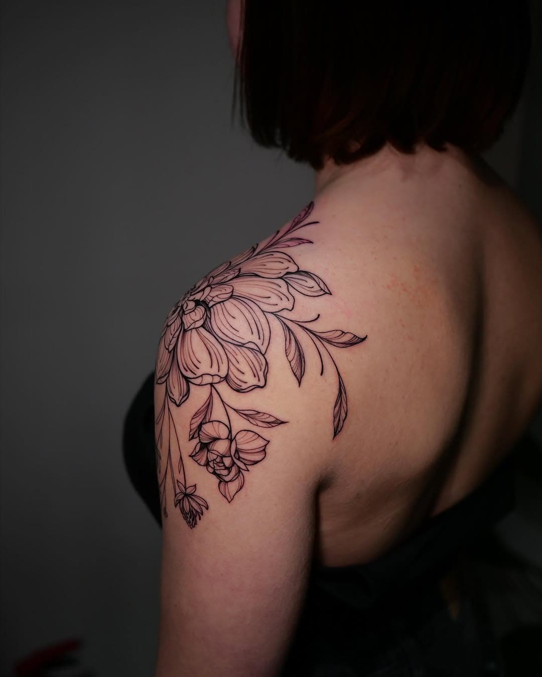 This piece was created during my last trip to Amsterdam for a wonderful client Helen, who traveled all the way from Germany. This is the third tattoo we’ve worked on together, and her trust means a lot to me. 

This time, we designed a delicate flower composition that flows from her shoulder to the front of her chest - a visible and intimate area that always feels so special to work on. Creating something for such a prominent space requires extra care and focus on the smallest details. 

I’m always deeply honored to bring these designs to life and to be part of someone’s story in this way 🌱