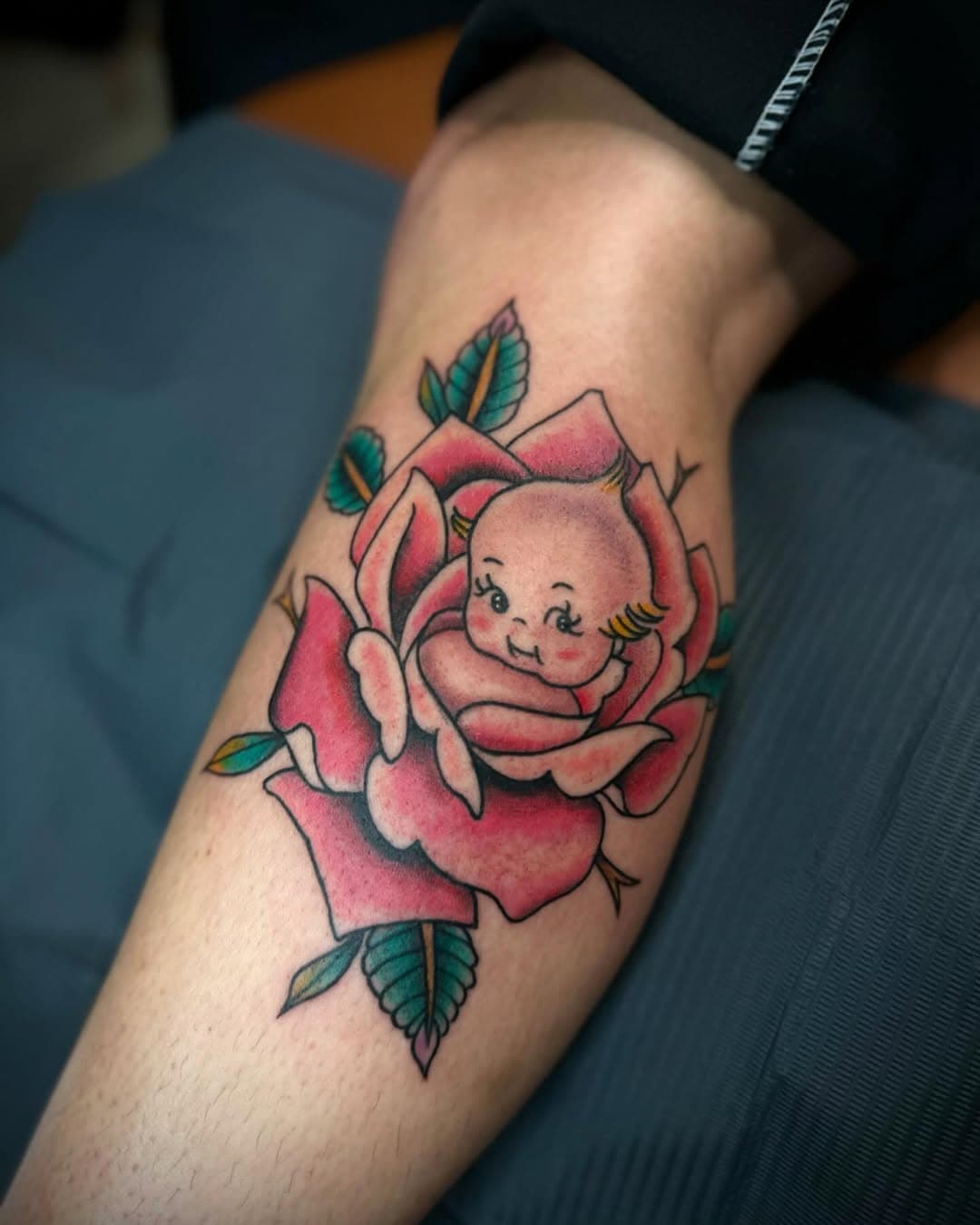 Cute rose kewpie by @mikewheelertattoo 
If you’re in need of something cute this December he’s got plenty of time 😎
📲Call/Text  the tat line! 9196996774 
Have a great day and thank you for looking 👍
#kewpietattoo #tattoo #durhamnc #easytigercustom #rosetattoo #nctattooers