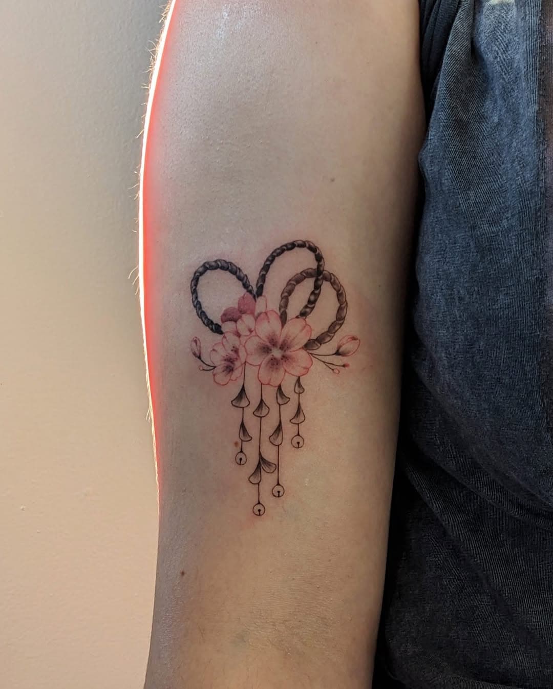 Cherry blossom charm by @tatie.ink