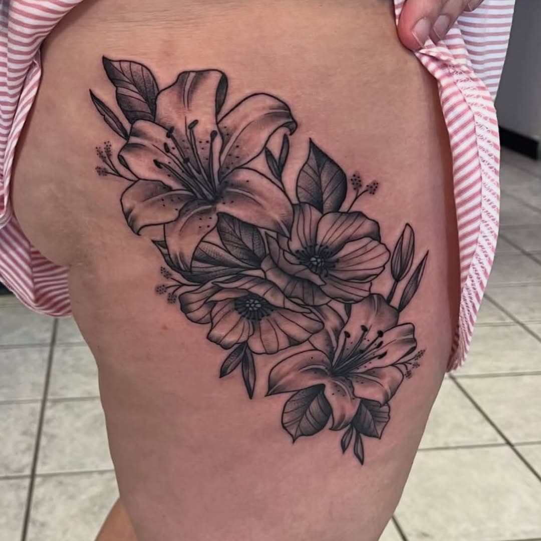 Some flowers done by @tattoosbymarceau! To schedule with Marceau, DM him. #tulsa #oklahoma #oklahomatattoo #floral #flowers #tattoo #tattooer