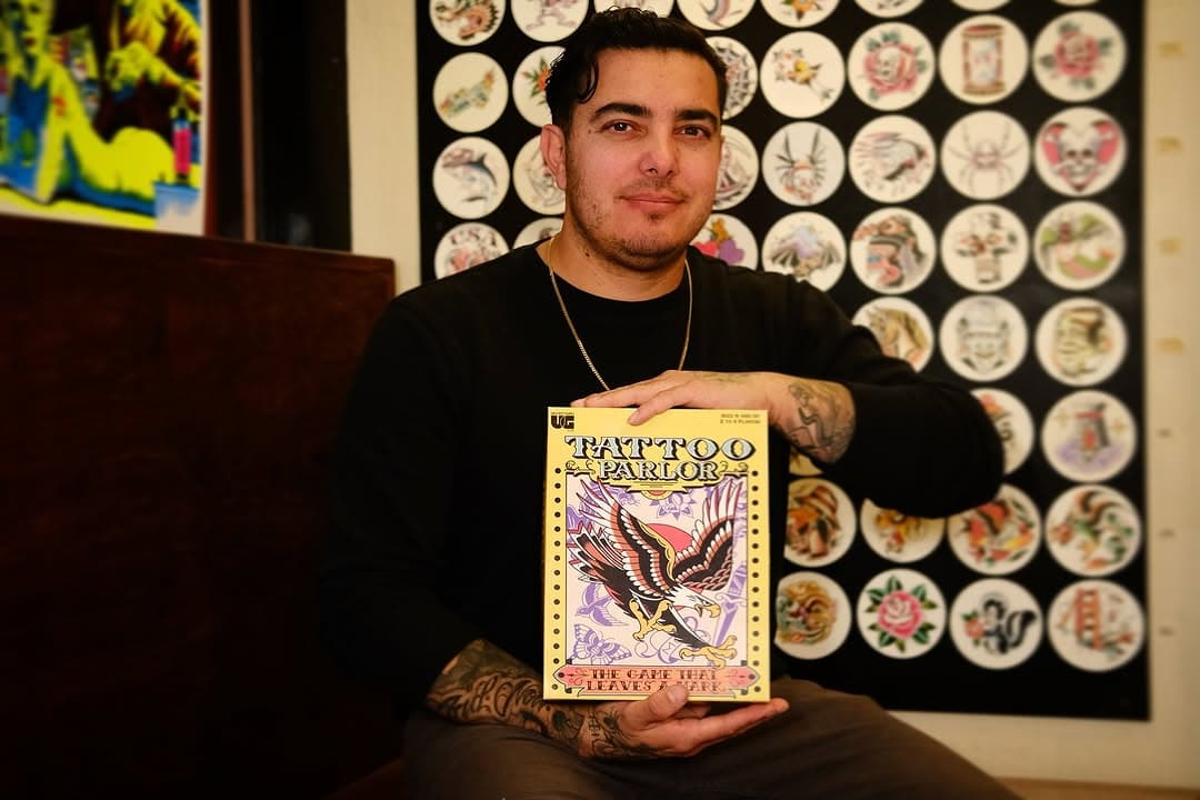 Hey IG world! I wanted to share with you a board game I created!  It’s been a few years in the works! I teamed up with @universitygames to create TATTOO PARLOR! 

When working with clients who are parents, I almost always hear about how fascinated their children are with tattoos. Five- and six-year-olds are obsessed with coloring and tracing them and parents literally become living canvases. Ten- and eleven-year-olds want to learn about the meaning of each tattoo and parents can turn one tattoo into a whole story. Teenagers talk to parents about their own ideas for a first tattoo and why it will be significant for them.

TATTOO PARLOR is an extension of all the above. It brings parents and children together in a fun and artistic way that will be interesting for all. The tattoo enthusiast will see this as an opportunity to involve their children in the process of getting a tattoo, allowing them to bring their children into a world they have only seen at a distance. It is my hope that this game is not only purchased by parents with tattoos, but by sisters, brothers, aunts, uncles and friends with tattoos who wish to share their love of this artform with family. Whether you have a tattoo or you do not, this game will allow you to experiment with this artform in a unique way, as no game like this currently exists! As children play the game, they can learn about the art of tattooing, fiscal responsibility, patience, and turn-taking while creating unique art along the way. The images I designed for this game are classic not only because they have been around for hundreds of years, but because at their root they evoke feelings of love, adventure, danger and beauty. A picture is worth a thousand words, and to a child seeing these images for the first time, they may inspire a story yet to be told. 

It’s on holiday sale in kohl’s, Walmart and target!

Thanks for reading and as always thank you for the support from every like, comment and tattoo you have ever let me make. ❤️