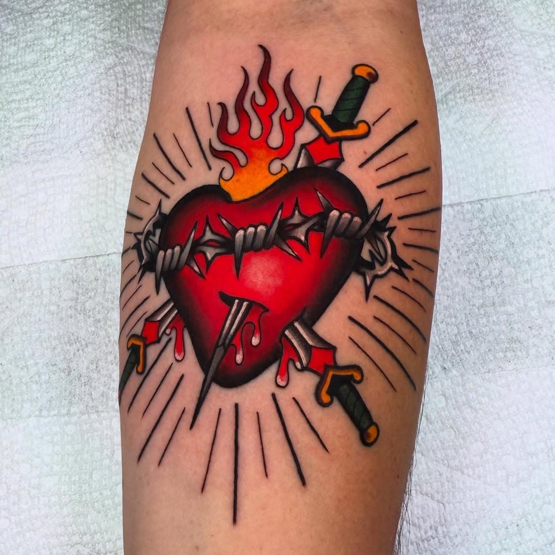 Made a cool one for my nephew and talented artist himself.  Happy Holidays!  Done @mountainviewtattooparlor #lomalinda #lomalindatattoo #inlandempire #tattoo #heart #hearts #hearttattoo #daggerheart #traditional #traditionaltattoo #bold #boldtattoos #boldwillhold #colortattoos #pma #workingclasstattooer #hooliganzartnink